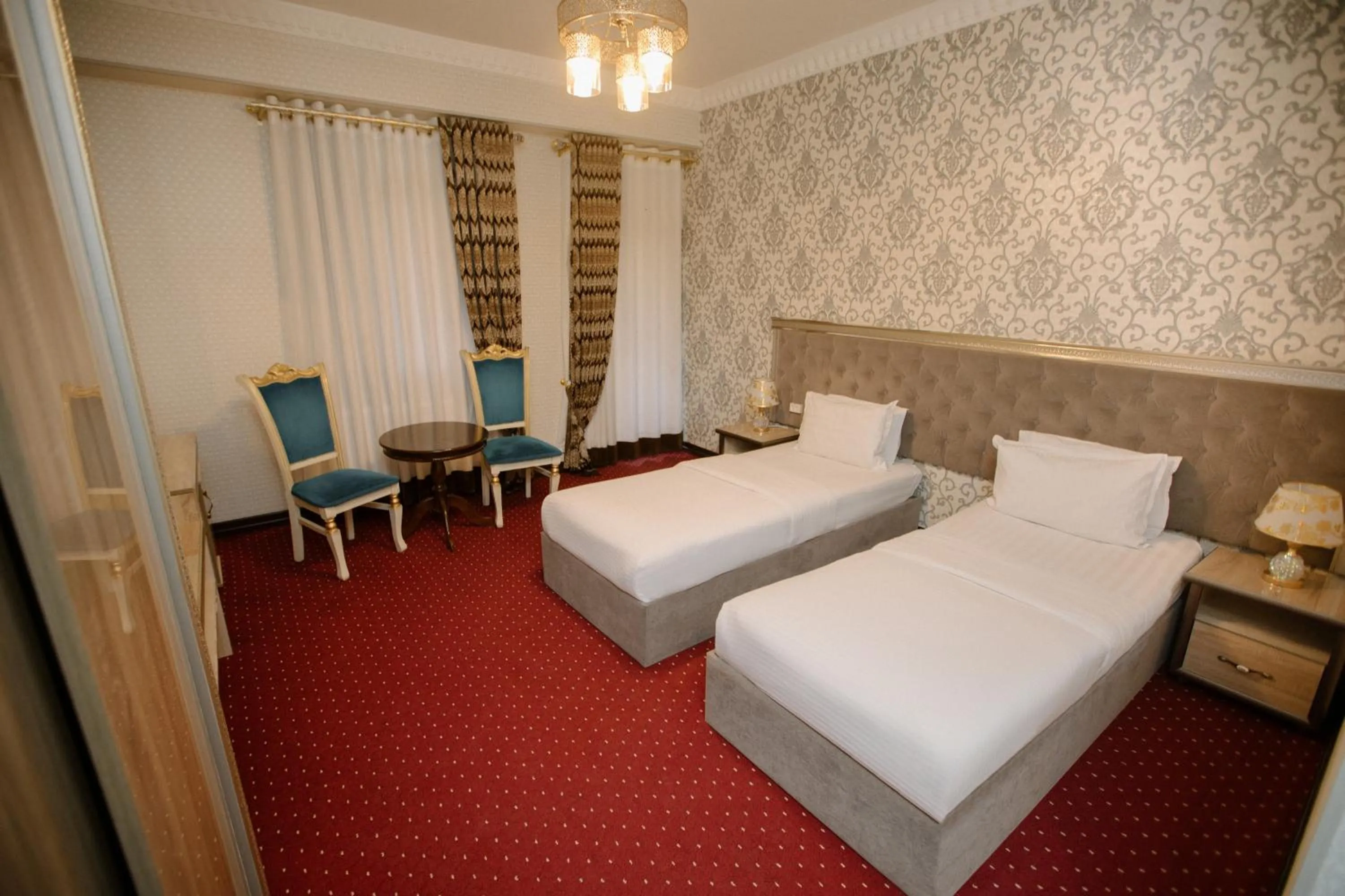 Bed in Dendi Plaza Hotel