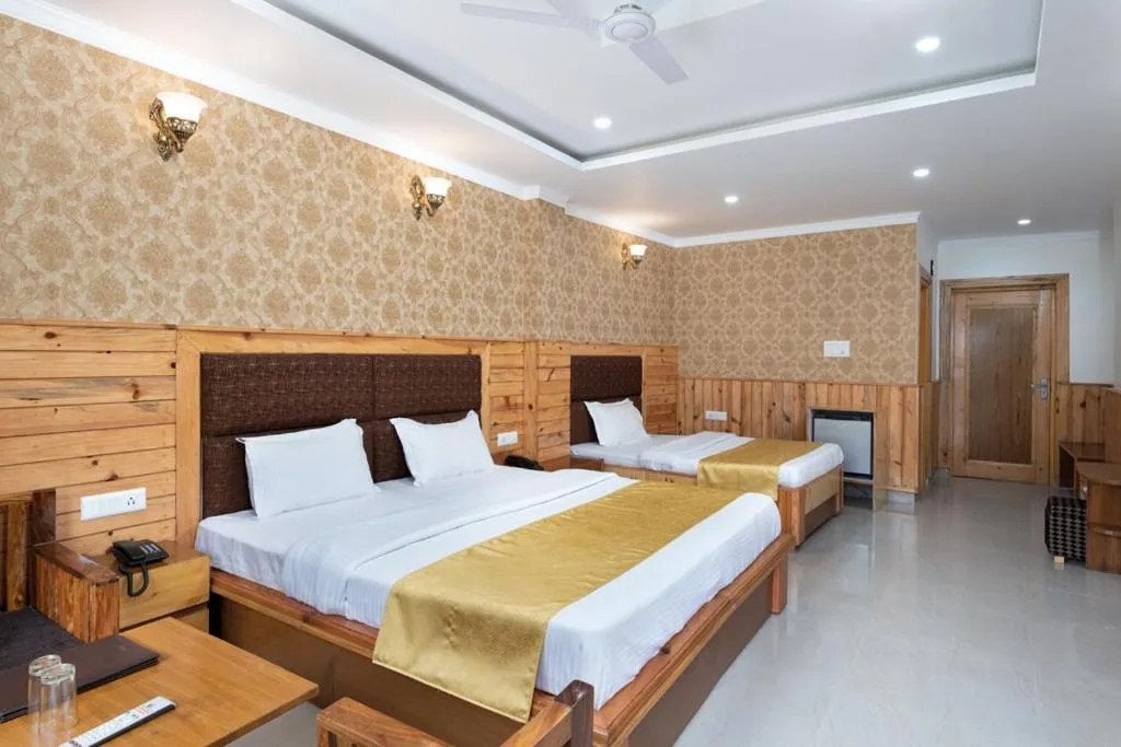 Bed in McLeod Ganj Mountain view