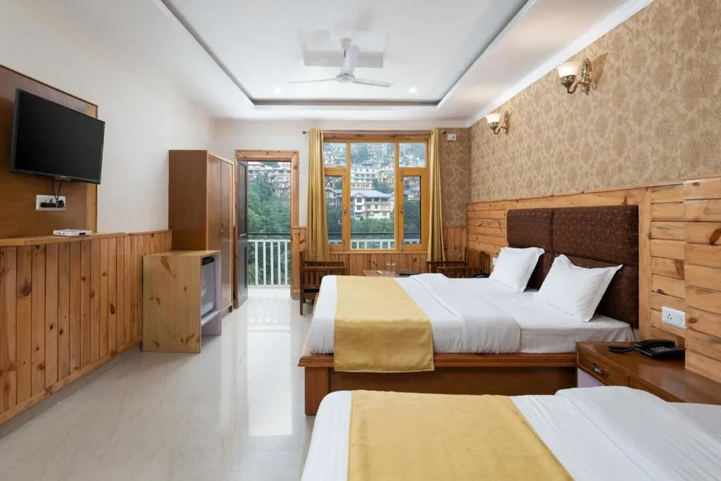Bed in McLeod Ganj Mountain view