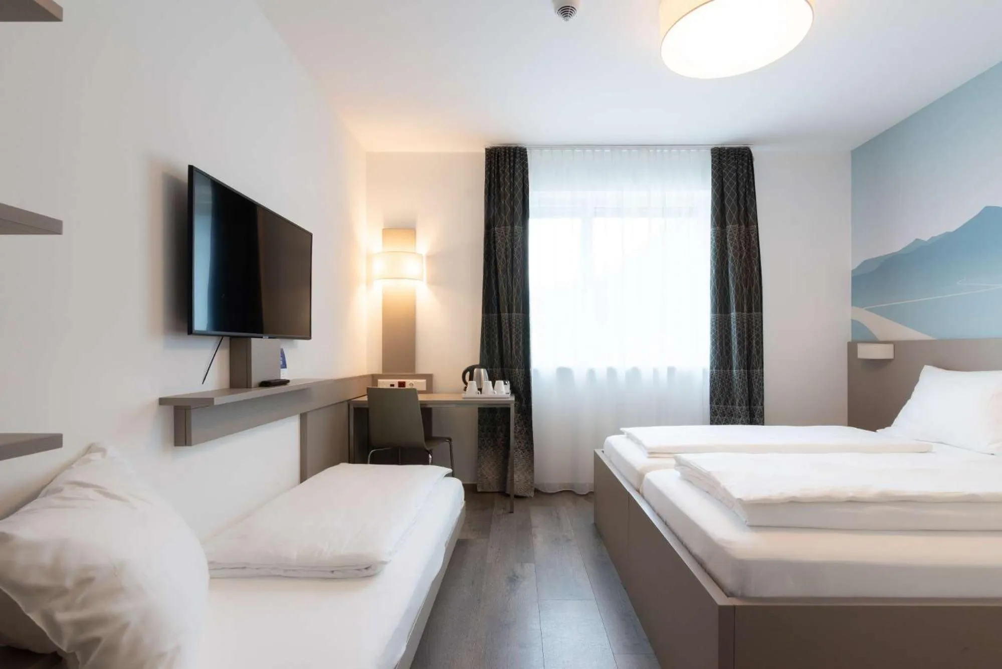 Photo of the whole room, Bed in Best Western Hotel Kiefersfelden