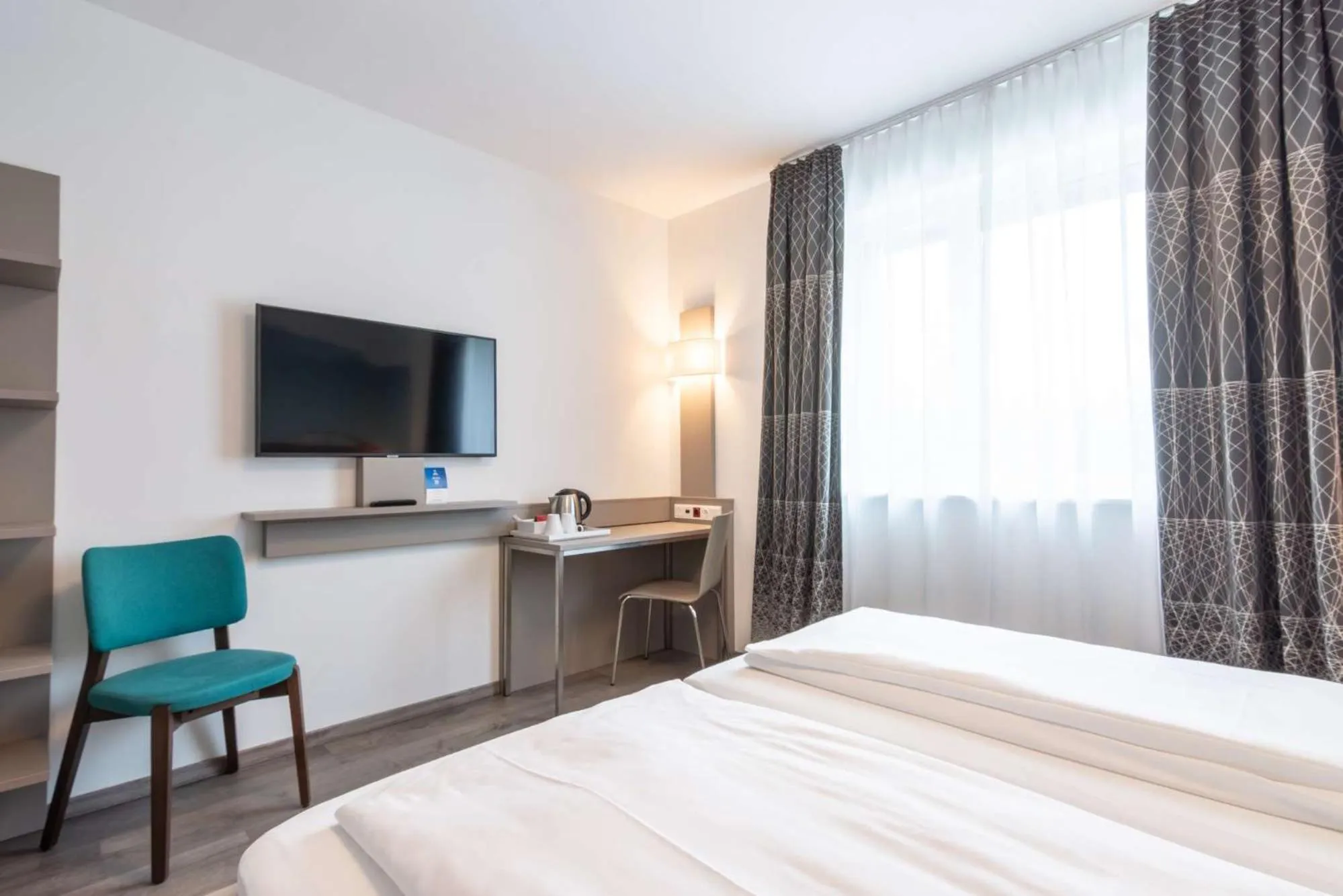 Photo of the whole room, Bed in Best Western Hotel Kiefersfelden