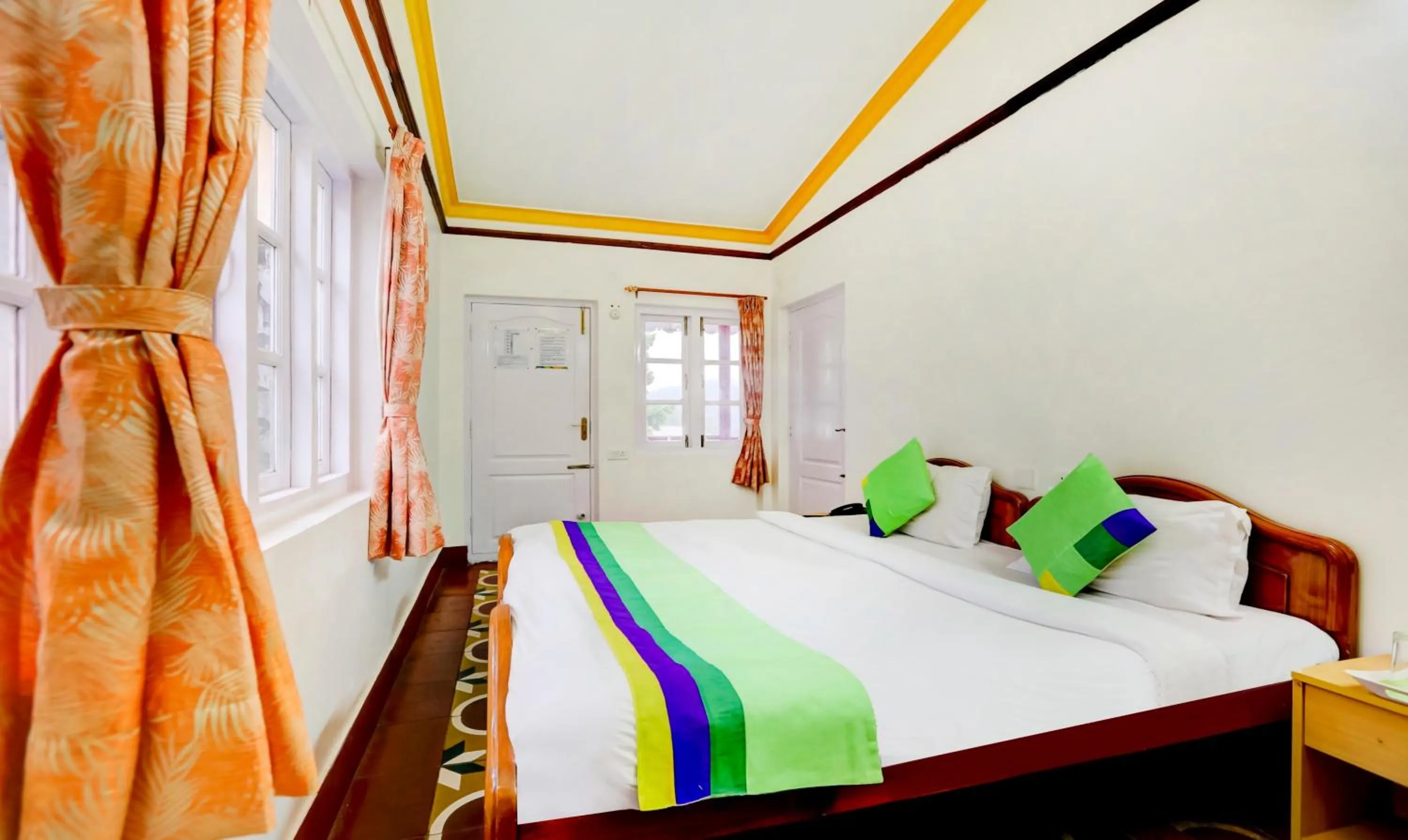 Bedroom, Bed in Treebo Atithi Bhavan, 1 Km From Ooty Lake