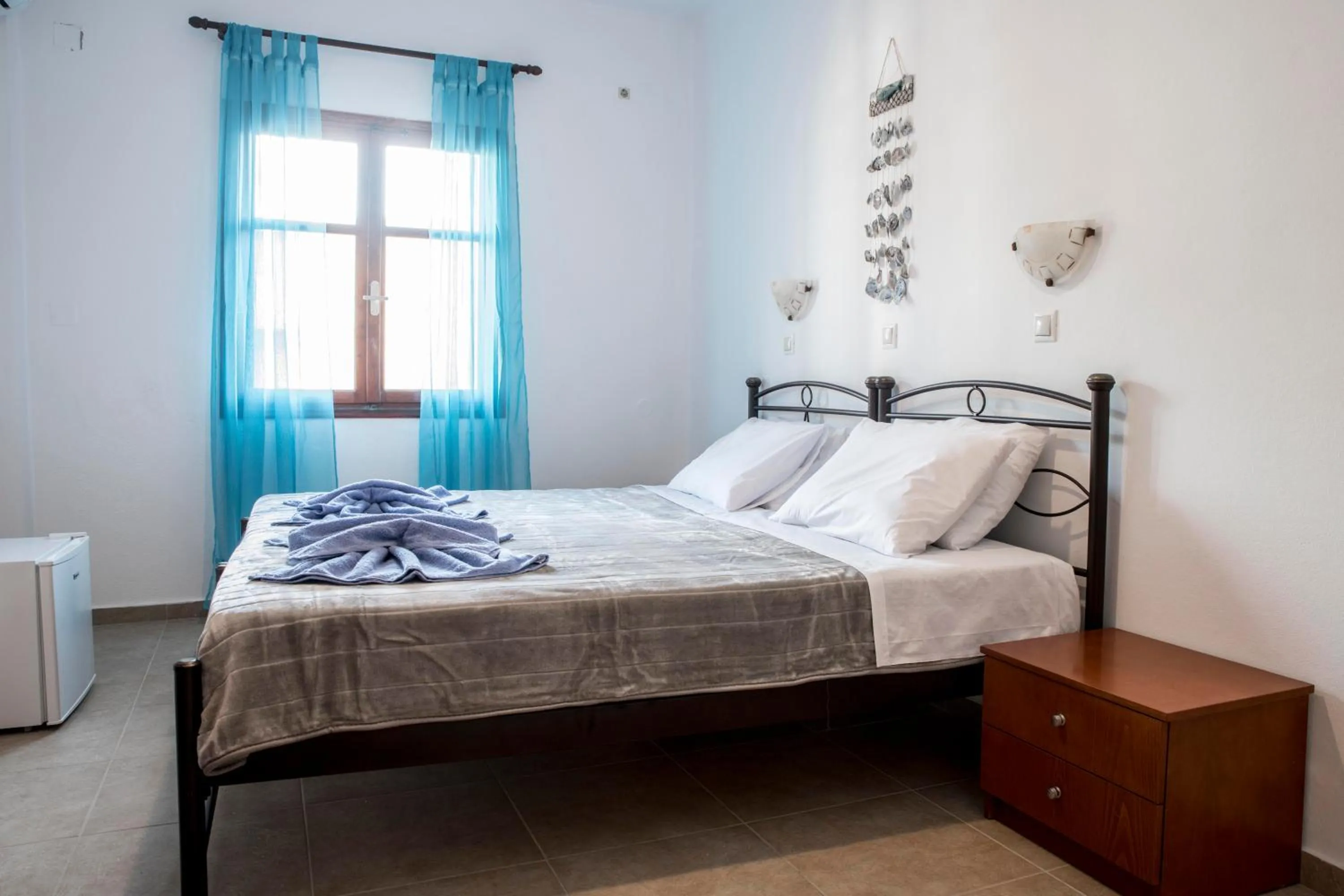 Bed in Bella Vita Style rooms & apartments