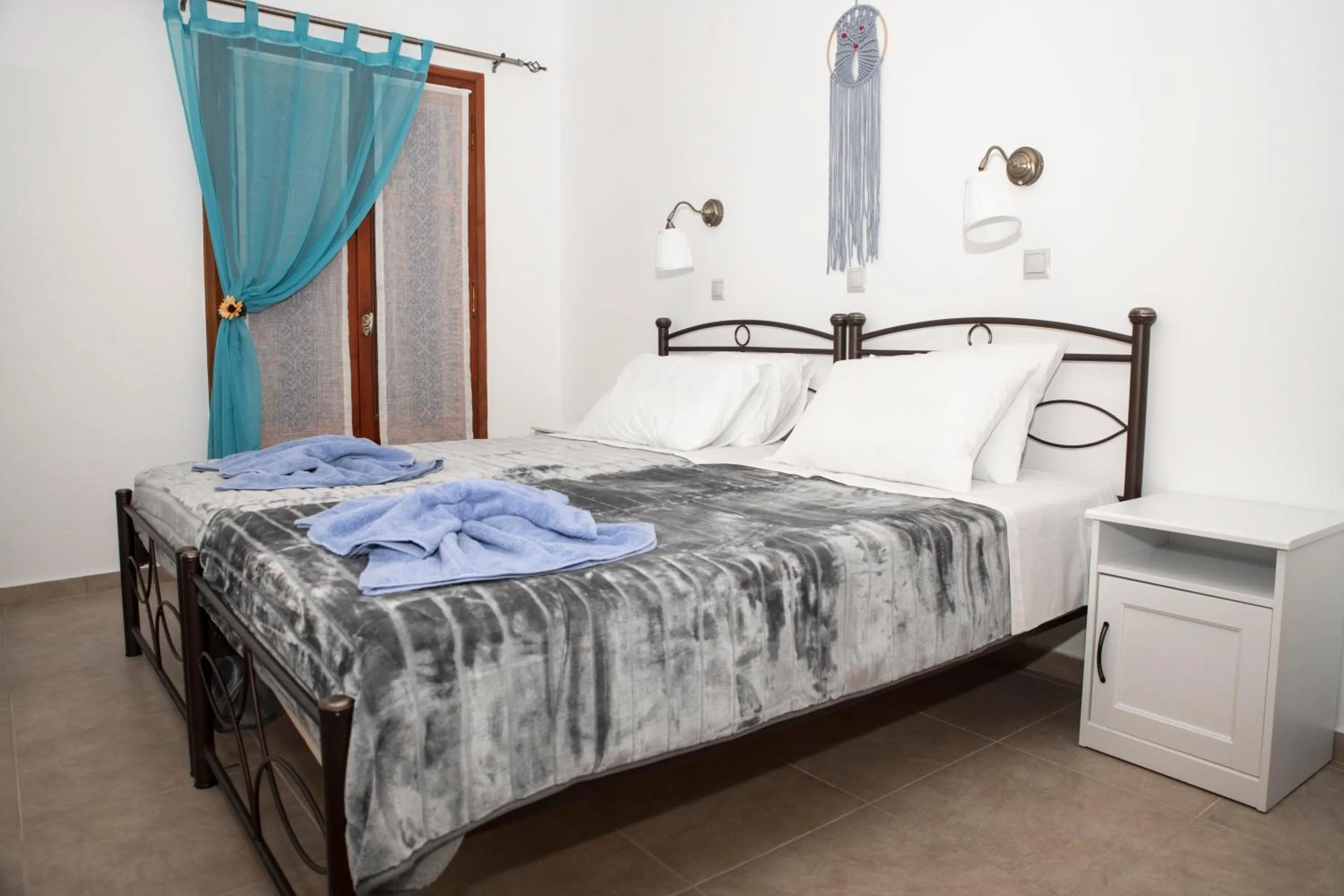 Bed in Bella Vita Style rooms & apartments