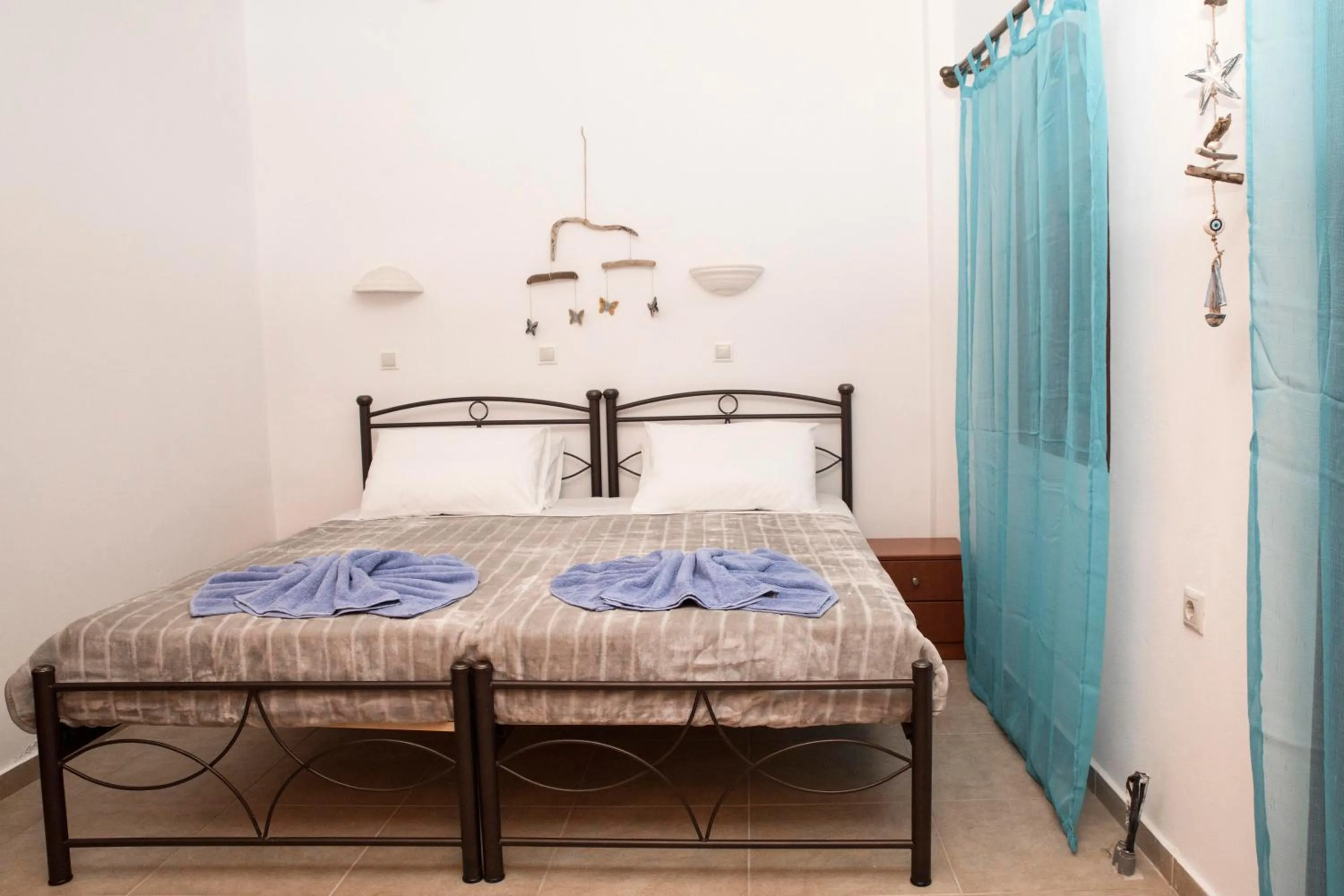 Bed in Bella Vita Style rooms & apartments