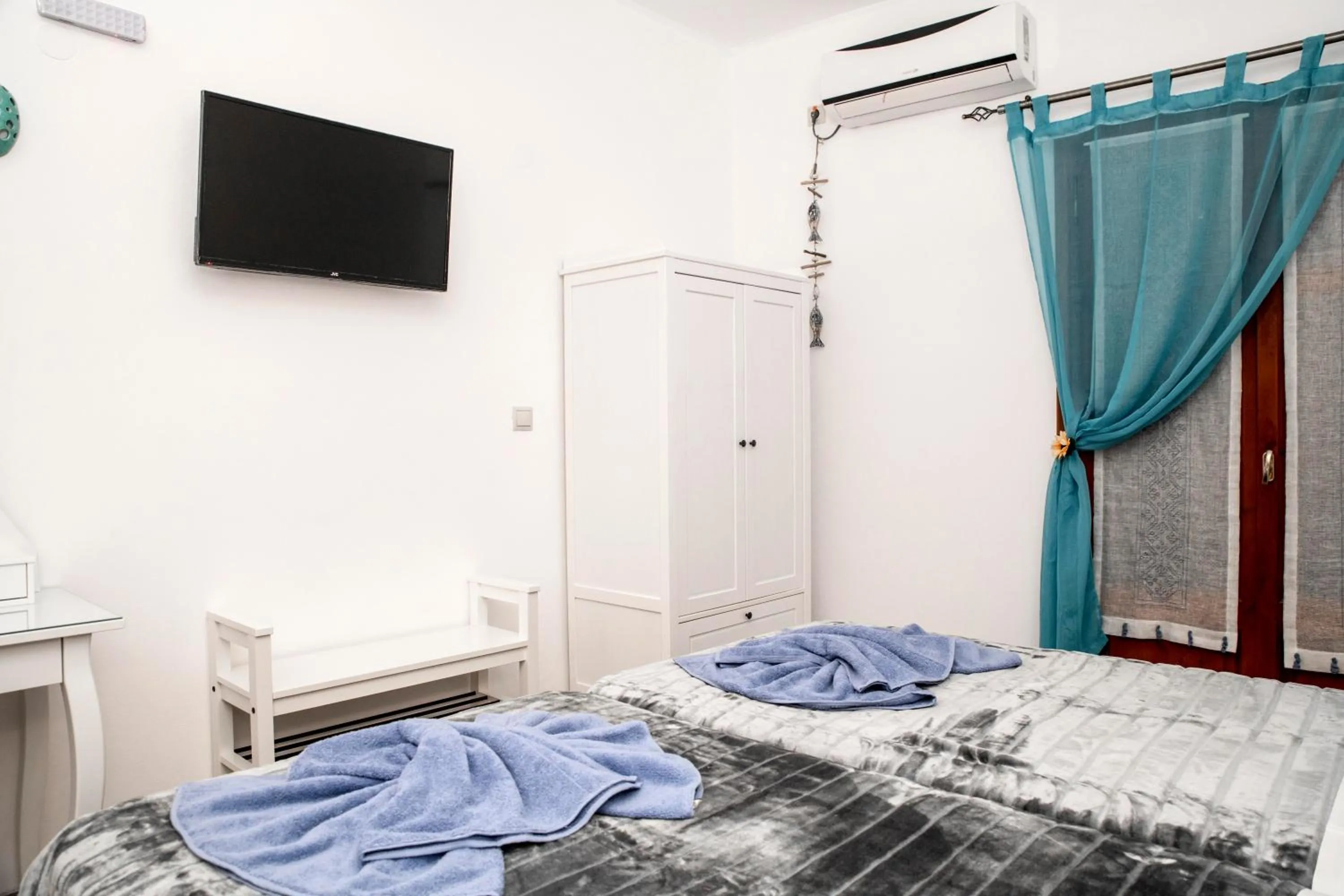 Bed in Bella Vita Style rooms & apartments