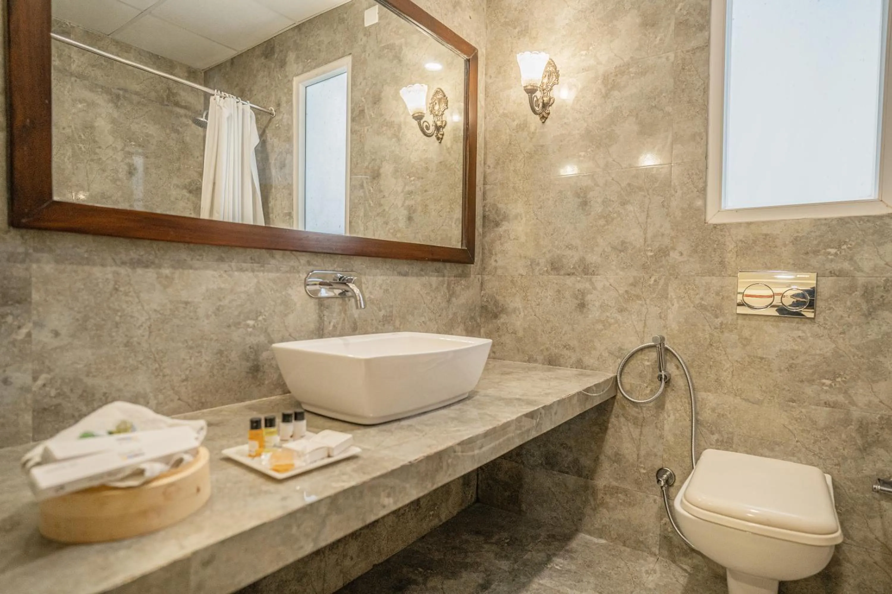 Toilet in Tripli Hotels Shambhu Villas