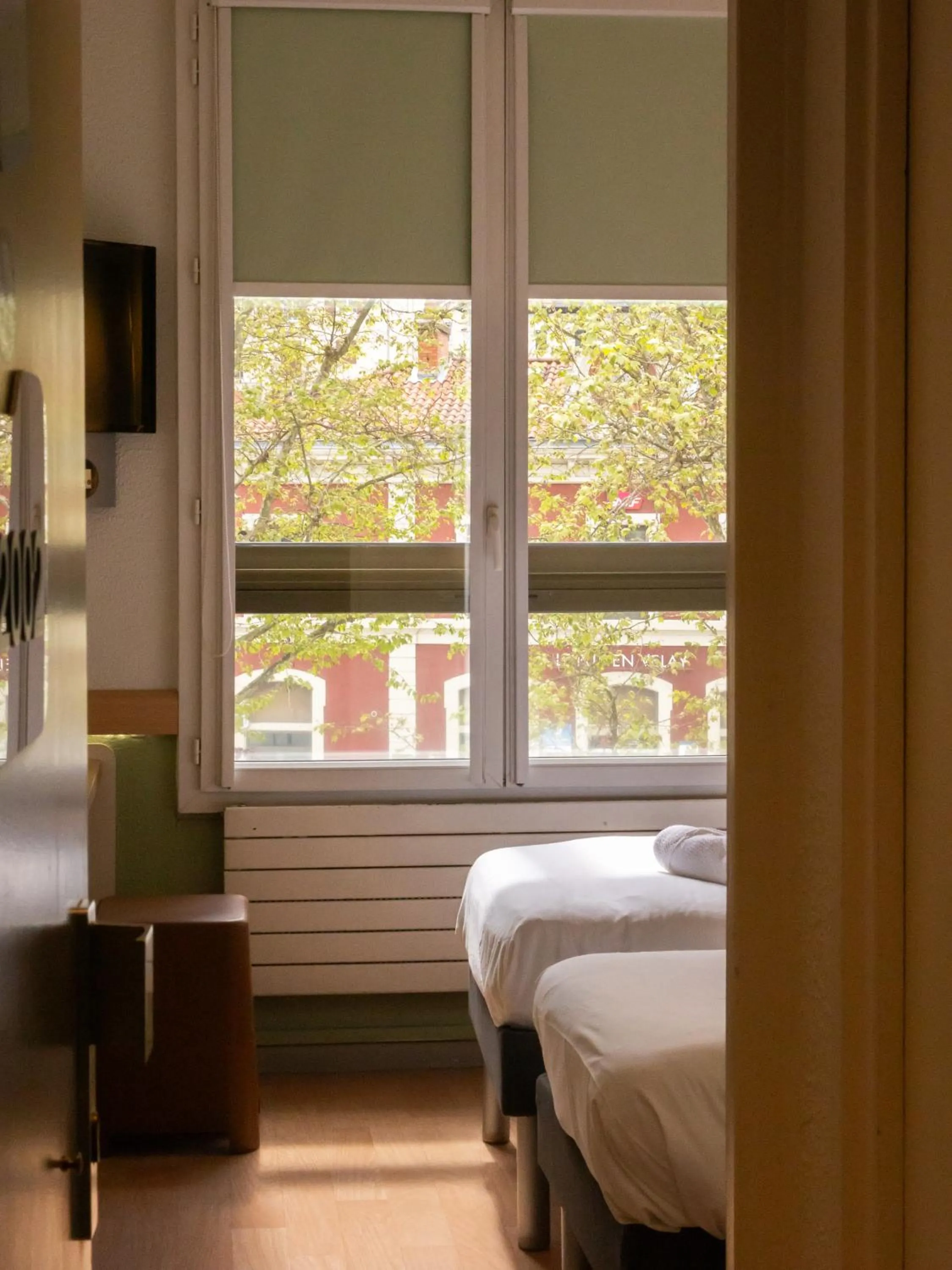 Bedroom, Bed in ibis budget Le Puy En Velay