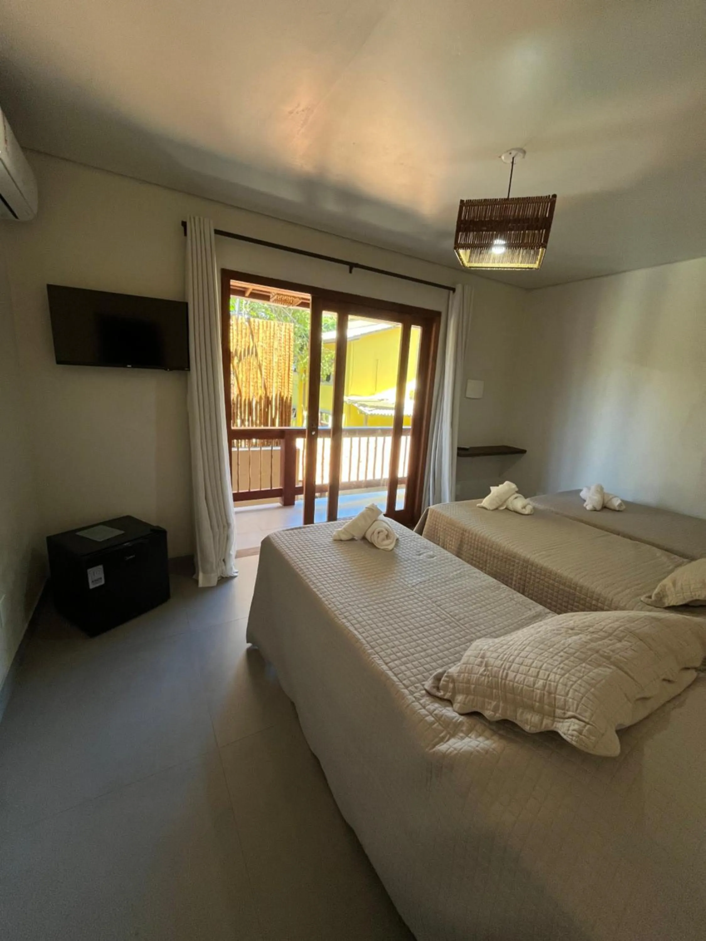 Bed in Pousada Vilarejo