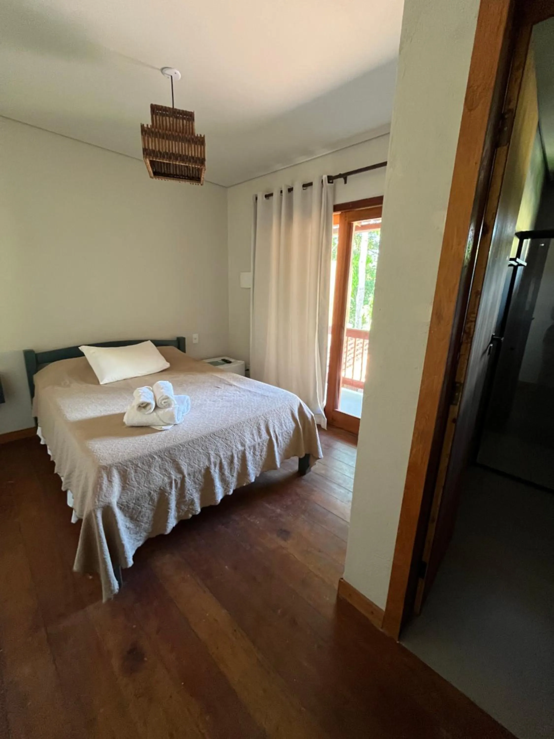 Photo of the whole room, Bed in Pousada Vilarejo