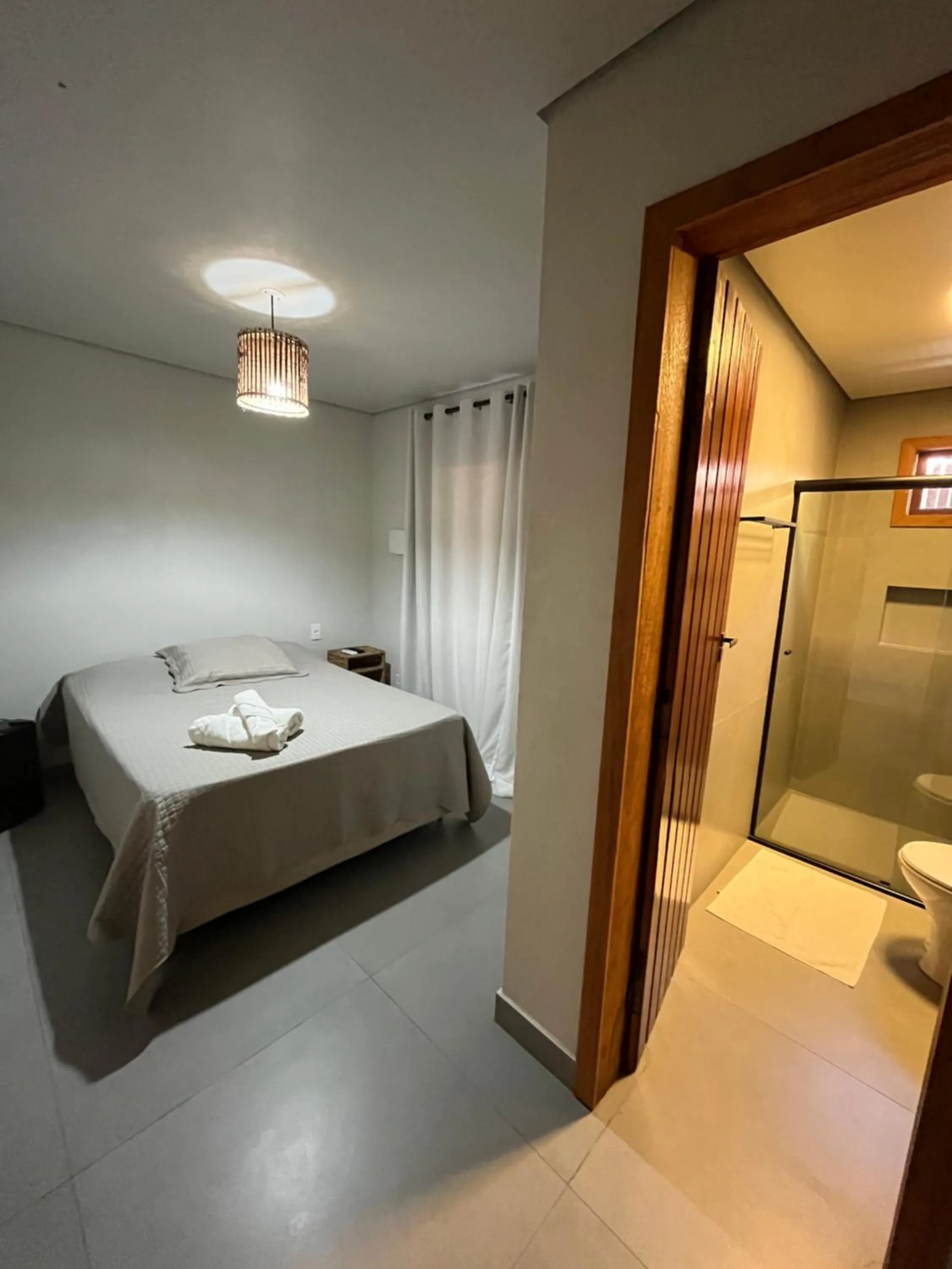 Bed in Pousada Vilarejo