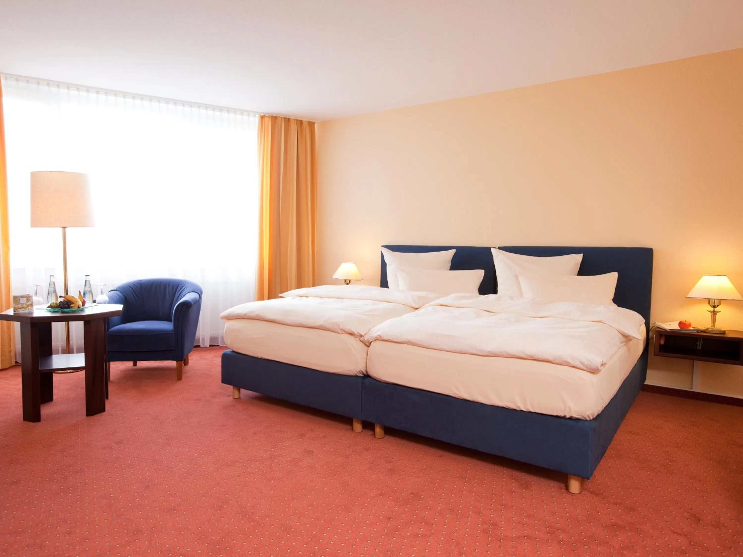 Photo of the whole room, Bed in Carathotel Basel/Weil am Rhein