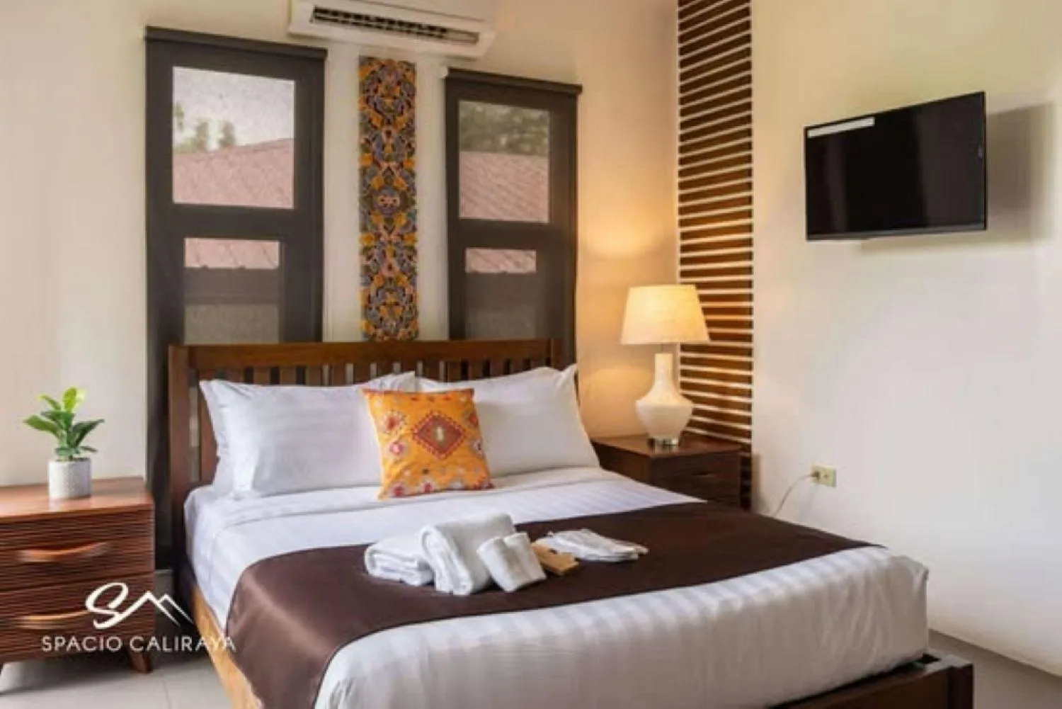 Bed in Spacio Caliraya Bed & Breakfast