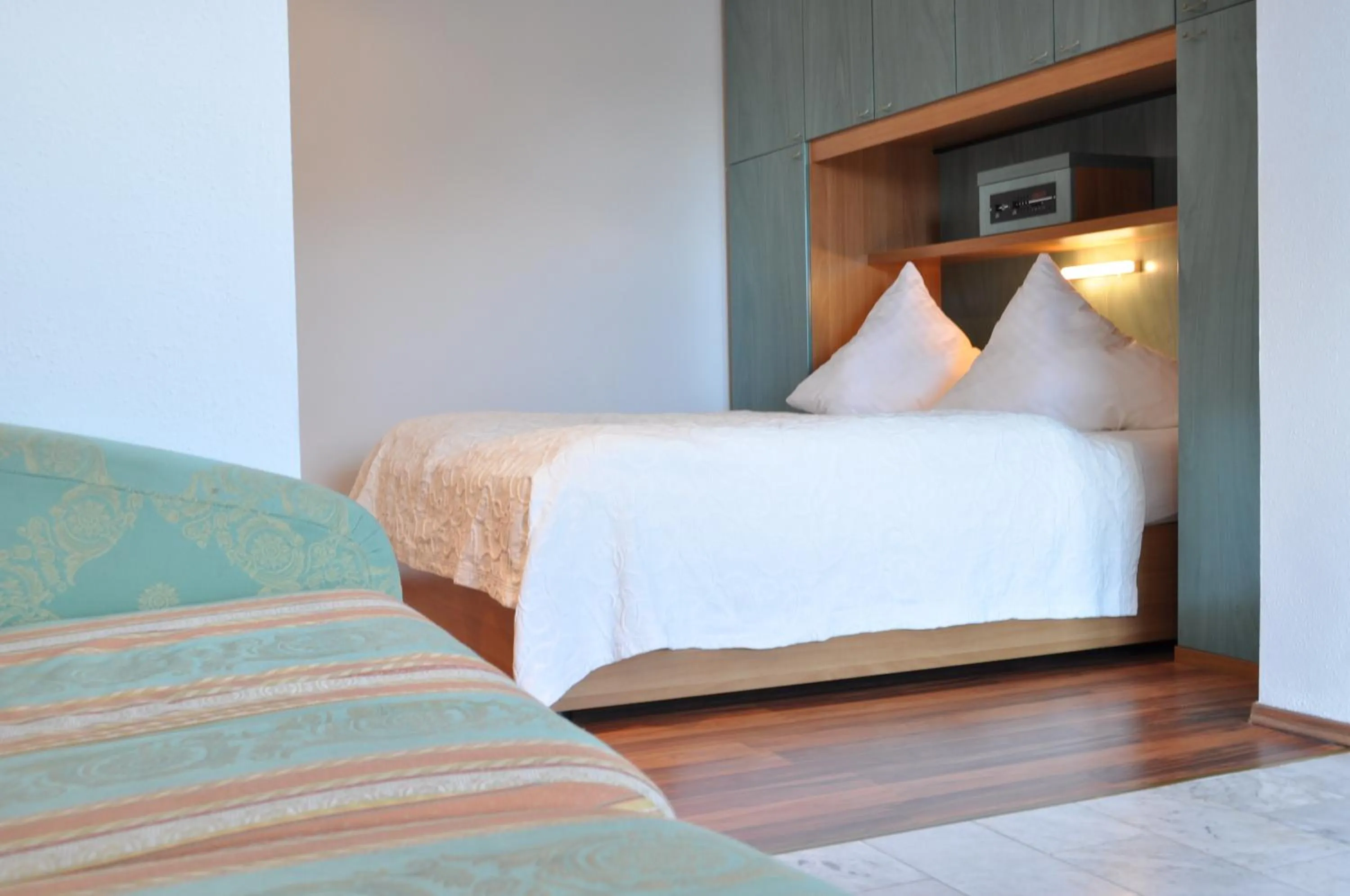 Photo of the whole room, Bed in Seehotel Herlinde