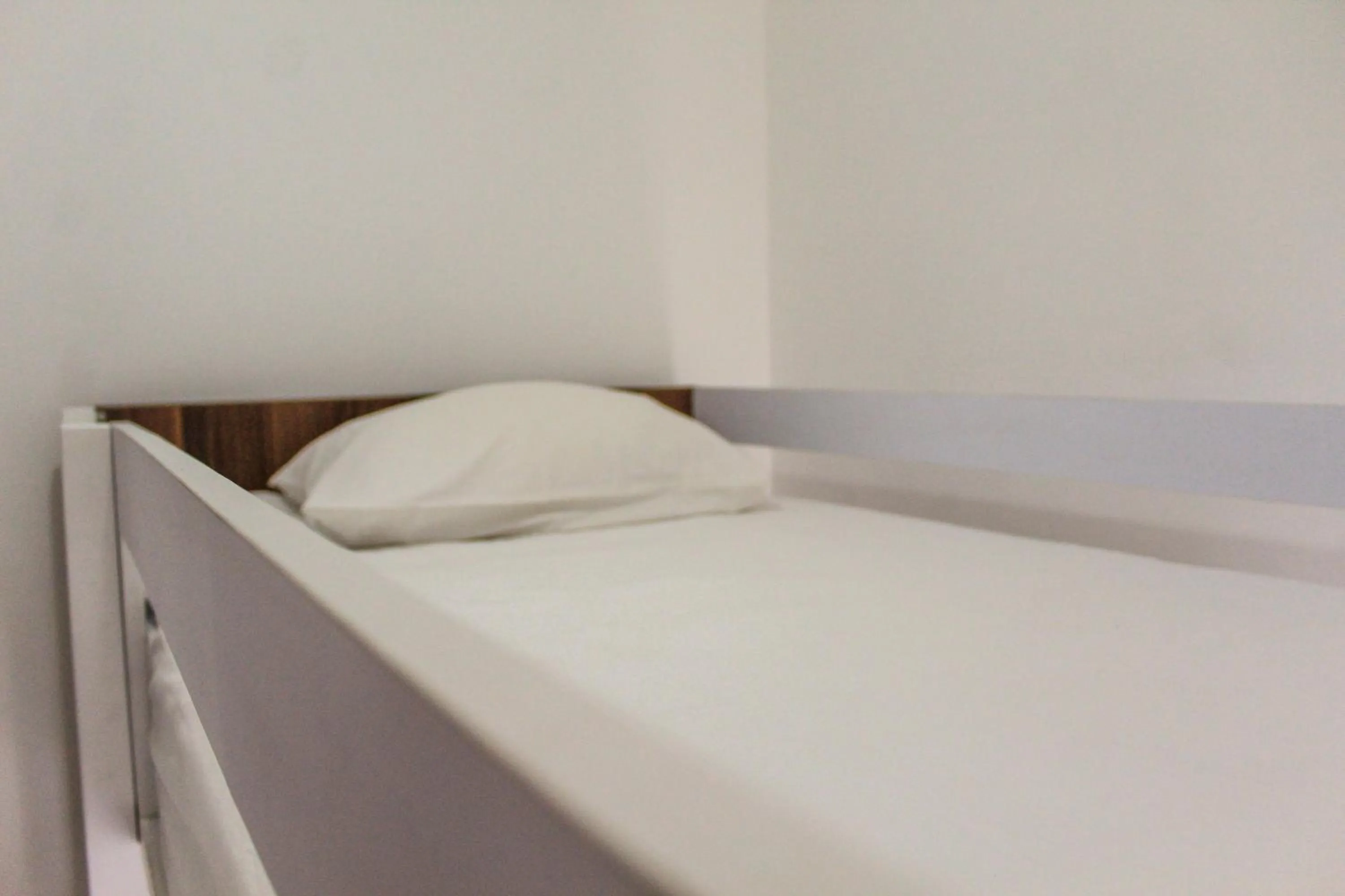 Bed in Relaxing 2BR Apartment at M-Town Residence By Travelio