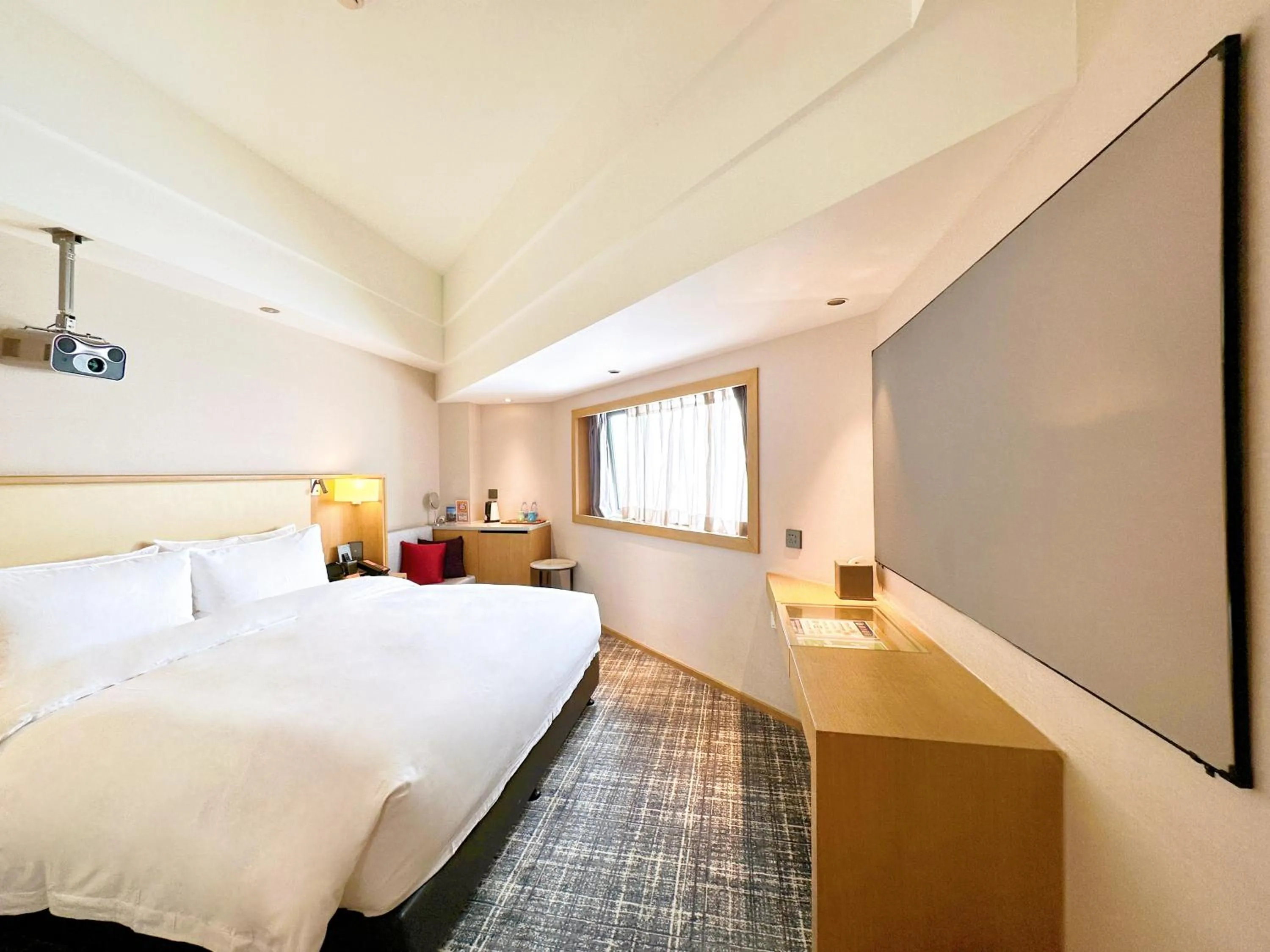 Photo of the whole room, Bed in Xence hotel near Xiamen Airport & SM Mall