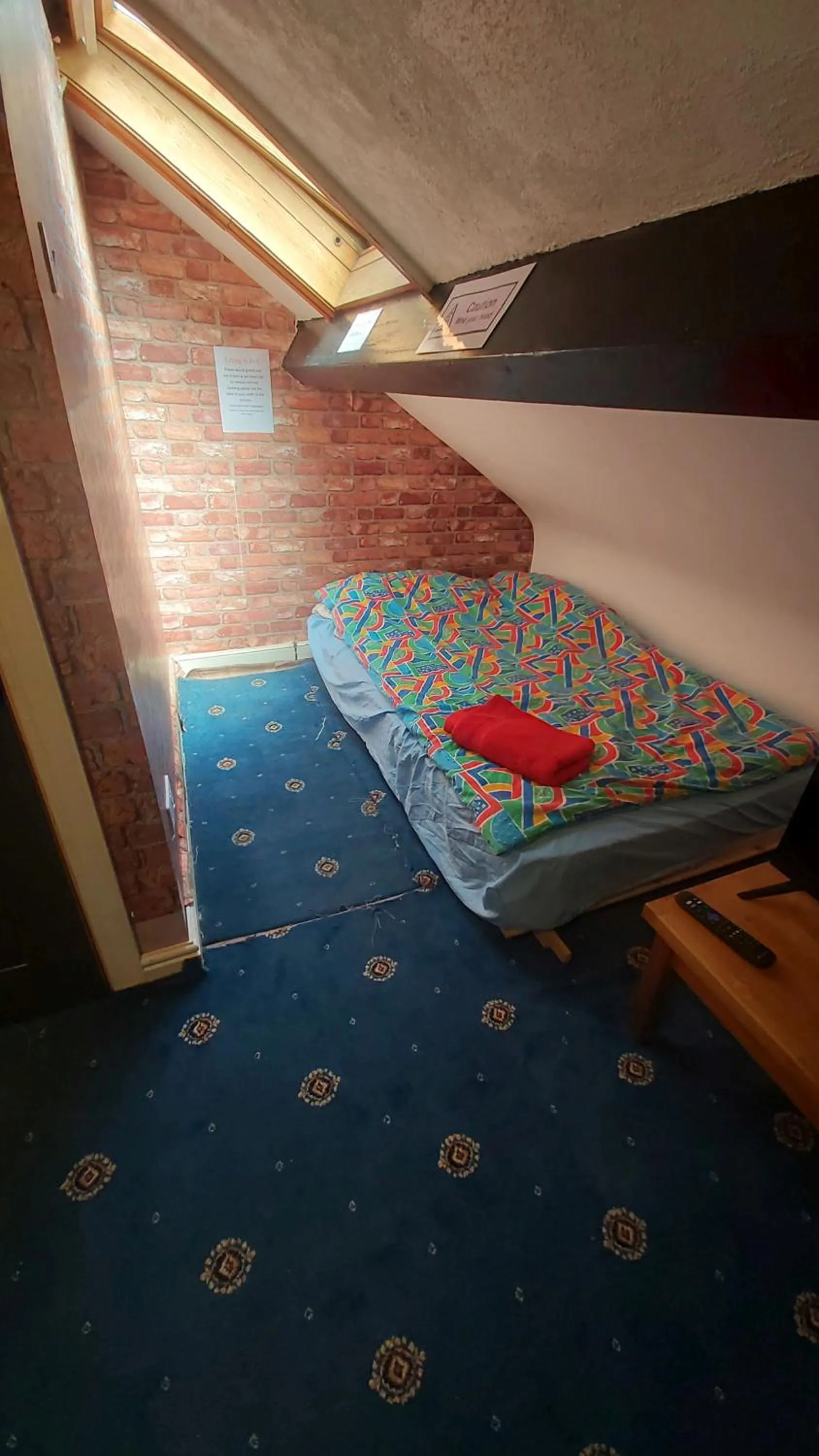 Bed in Phoenix Nights Guest House