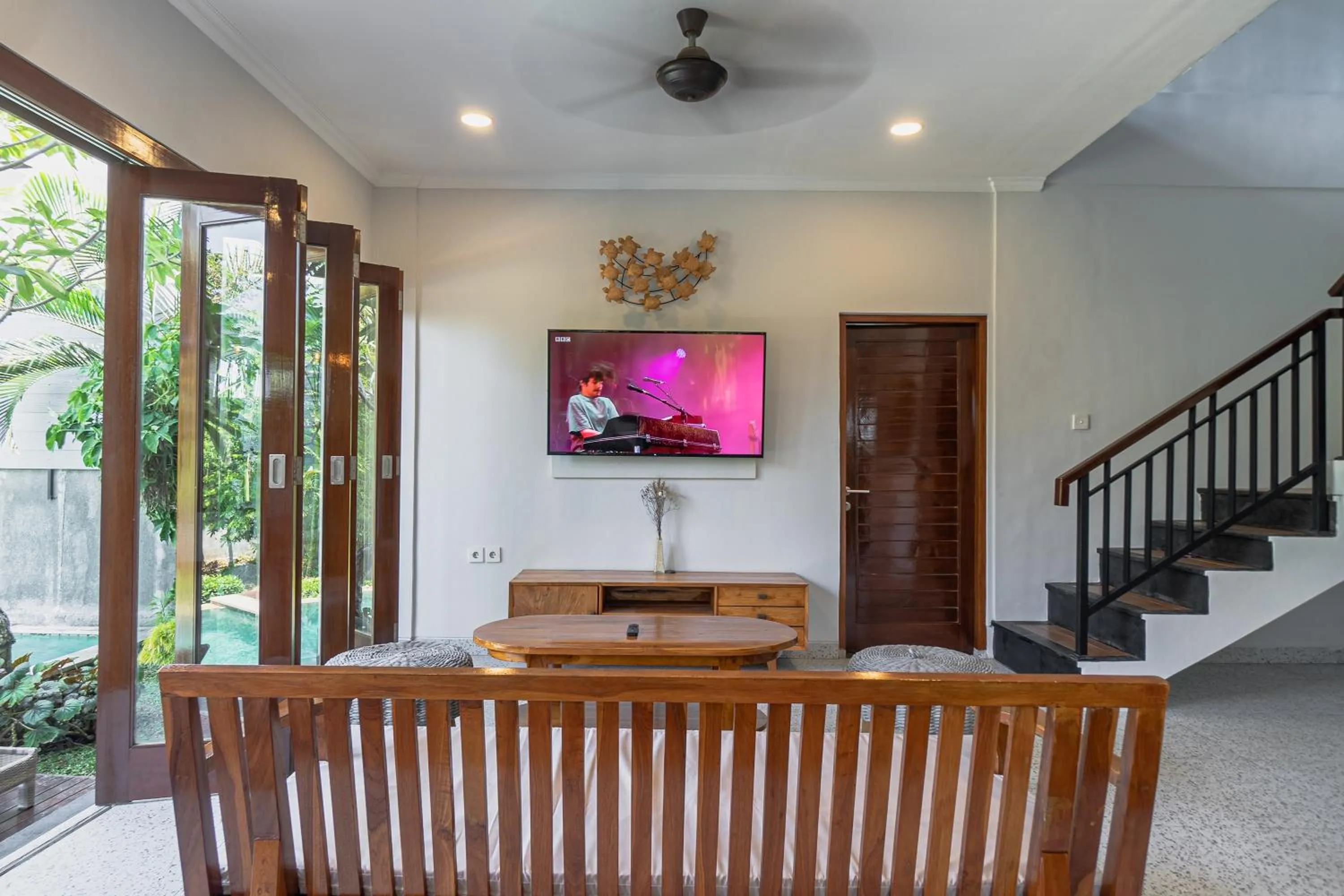 Communal lounge/ TV room in Belle Asana