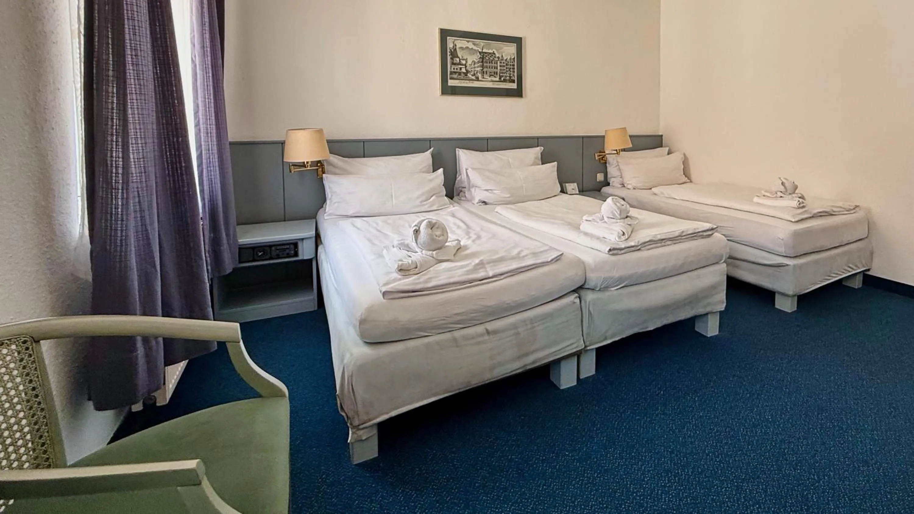 Bed in Altstadthotel Augsburg