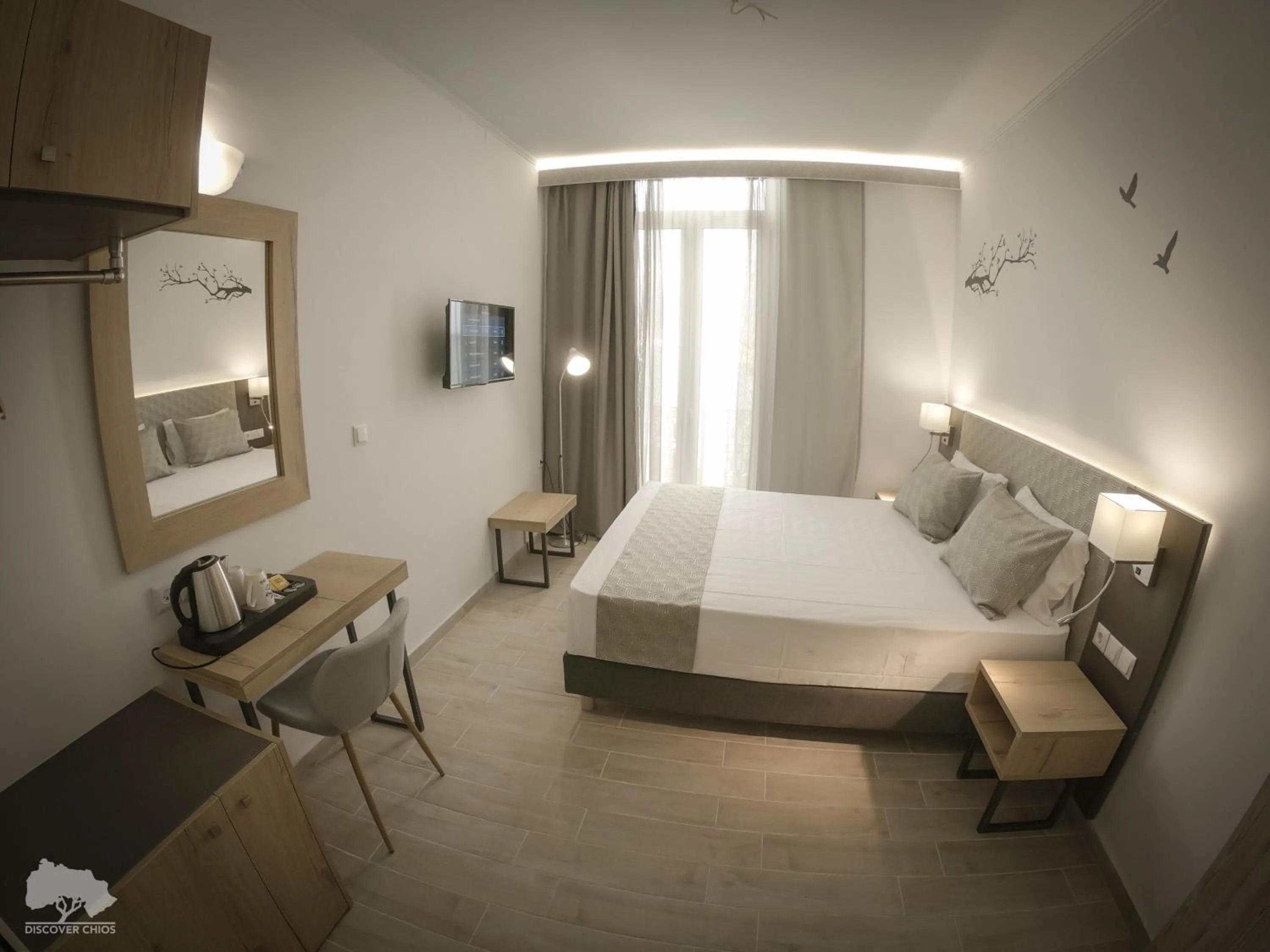 Photo of the whole room, Bed in Costa Point Chios