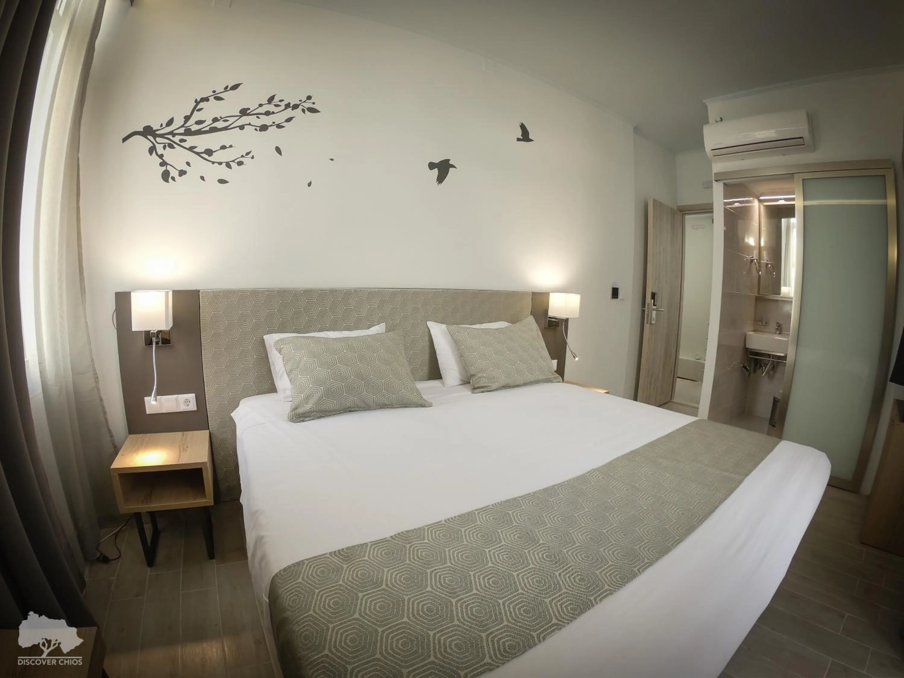 Photo of the whole room, Bed in Costa Point Chios