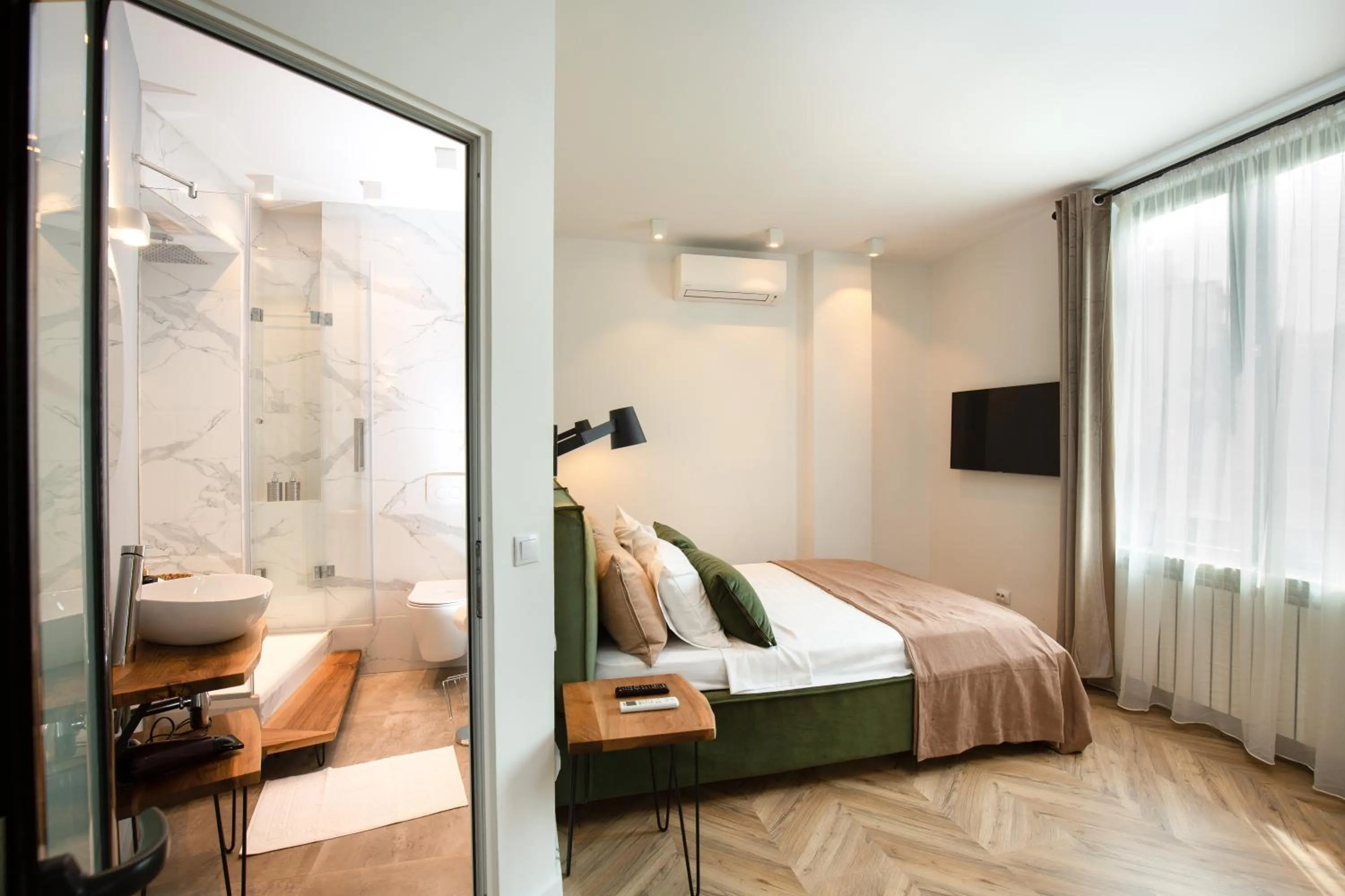 Bedroom, Bed in Metropole Apartments Royal Residence