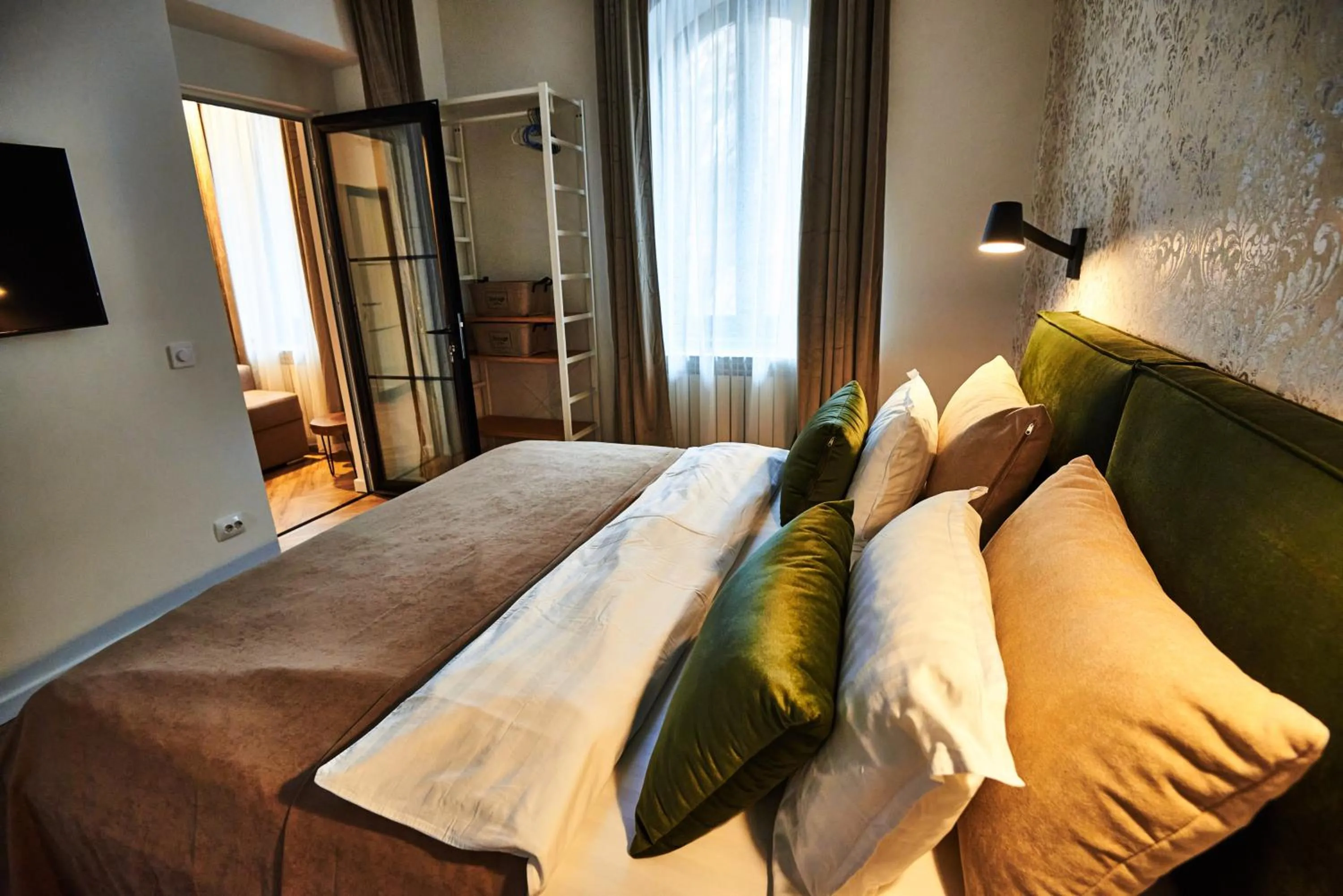 Bed in Metropole Apartments Royal Residence