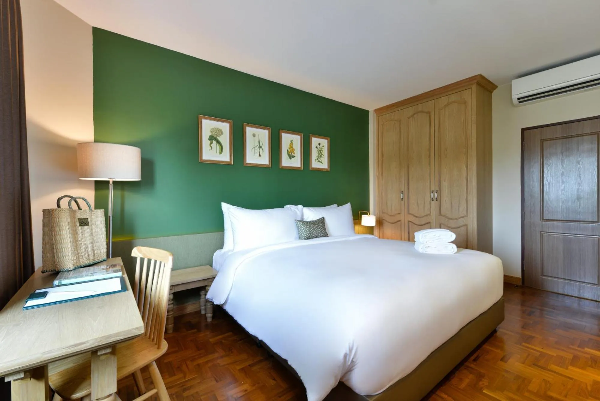 Bed in The Raintree Hotel Chiang Mai