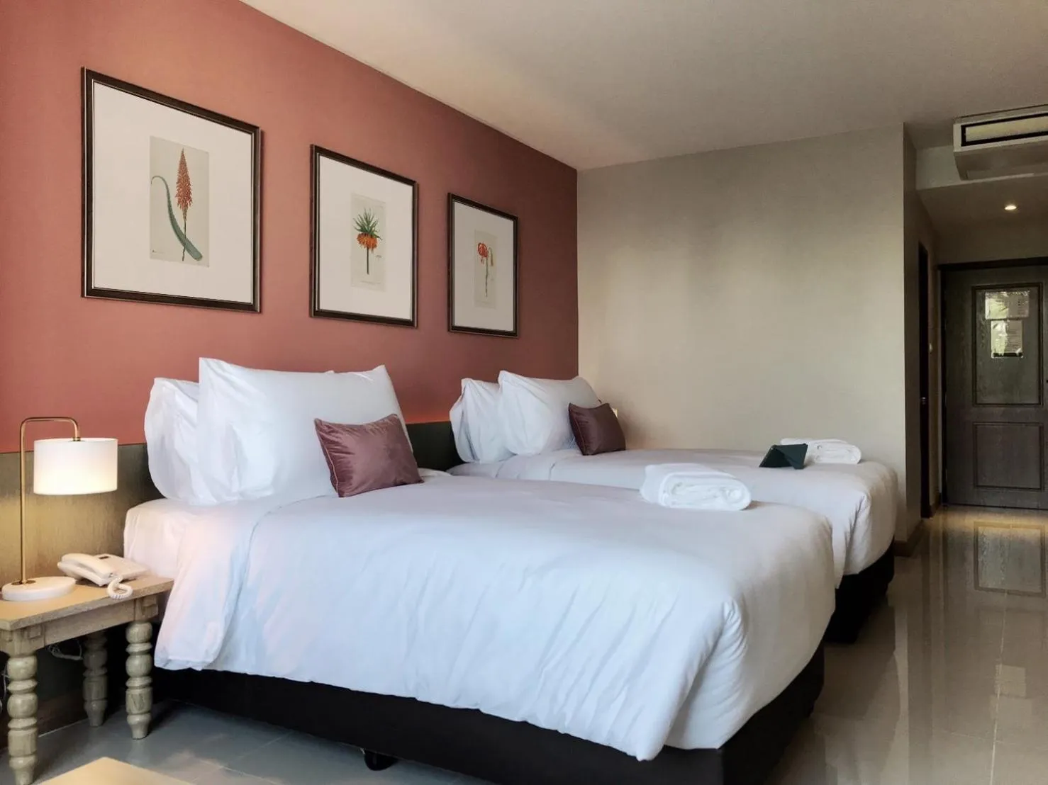 Bed in The Raintree Hotel Chiang Mai