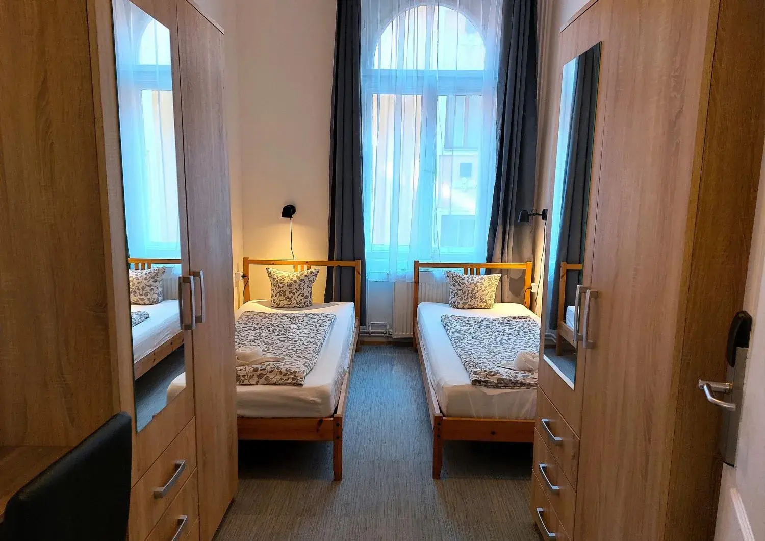 Twin Room with Shared Bathroom in GoodMo Budapest Smart Rooms Twin Room with Shared Bathroom in GoodMo Budapest Smart Rooms
