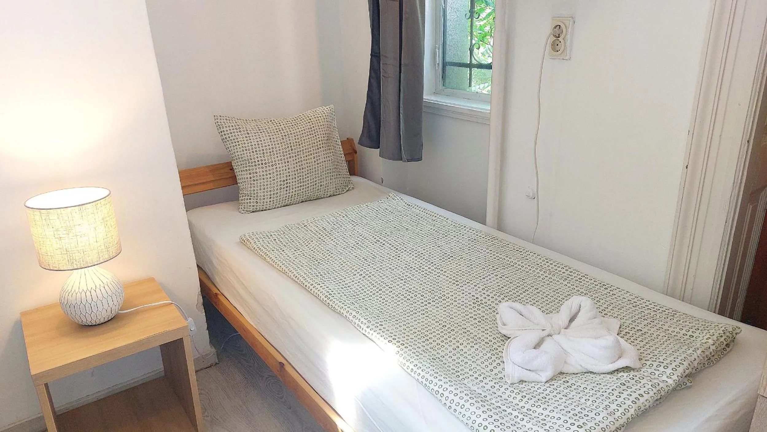 Bed in GoodMo Budapest Smart Rooms