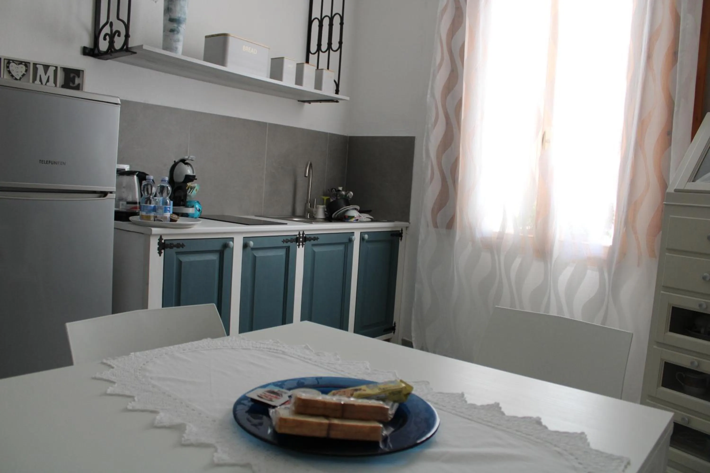 Kitchen or kitchenette in B&B Roseddu