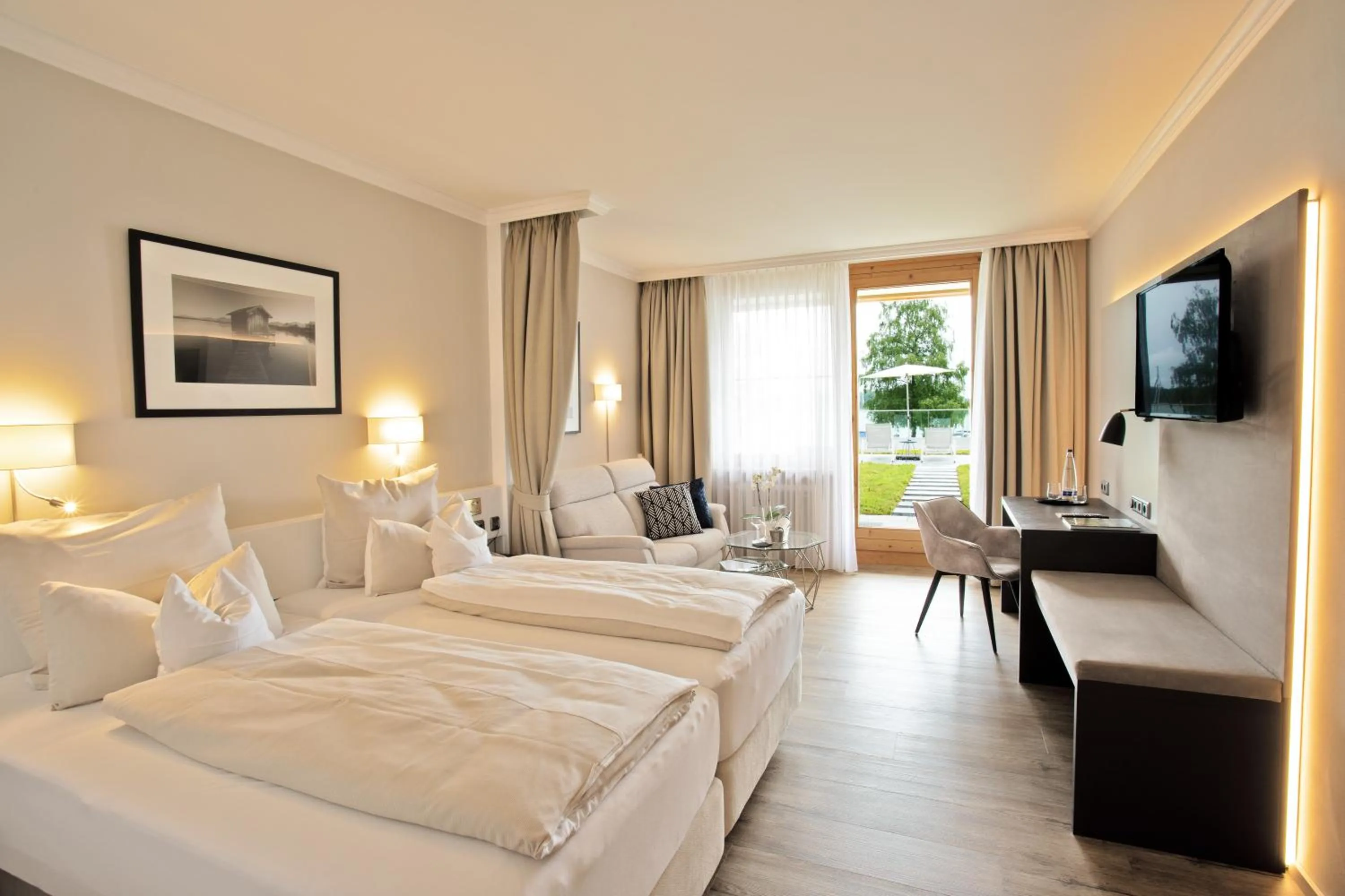 Photo of the whole room, Bed in Yachthotel Chiemsee GmbH
