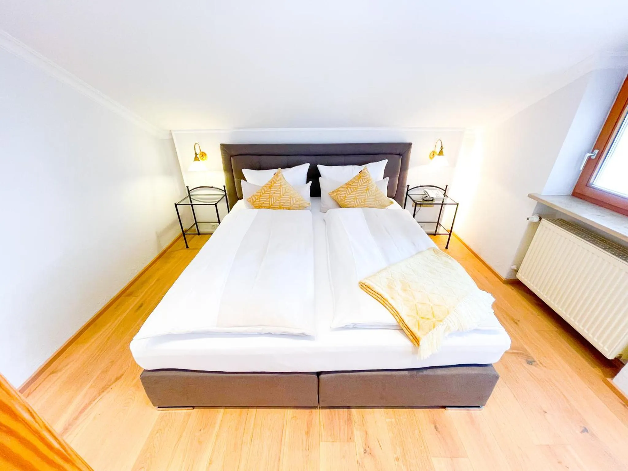 Photo of the whole room, Bed in Yachthotel Chiemsee GmbH