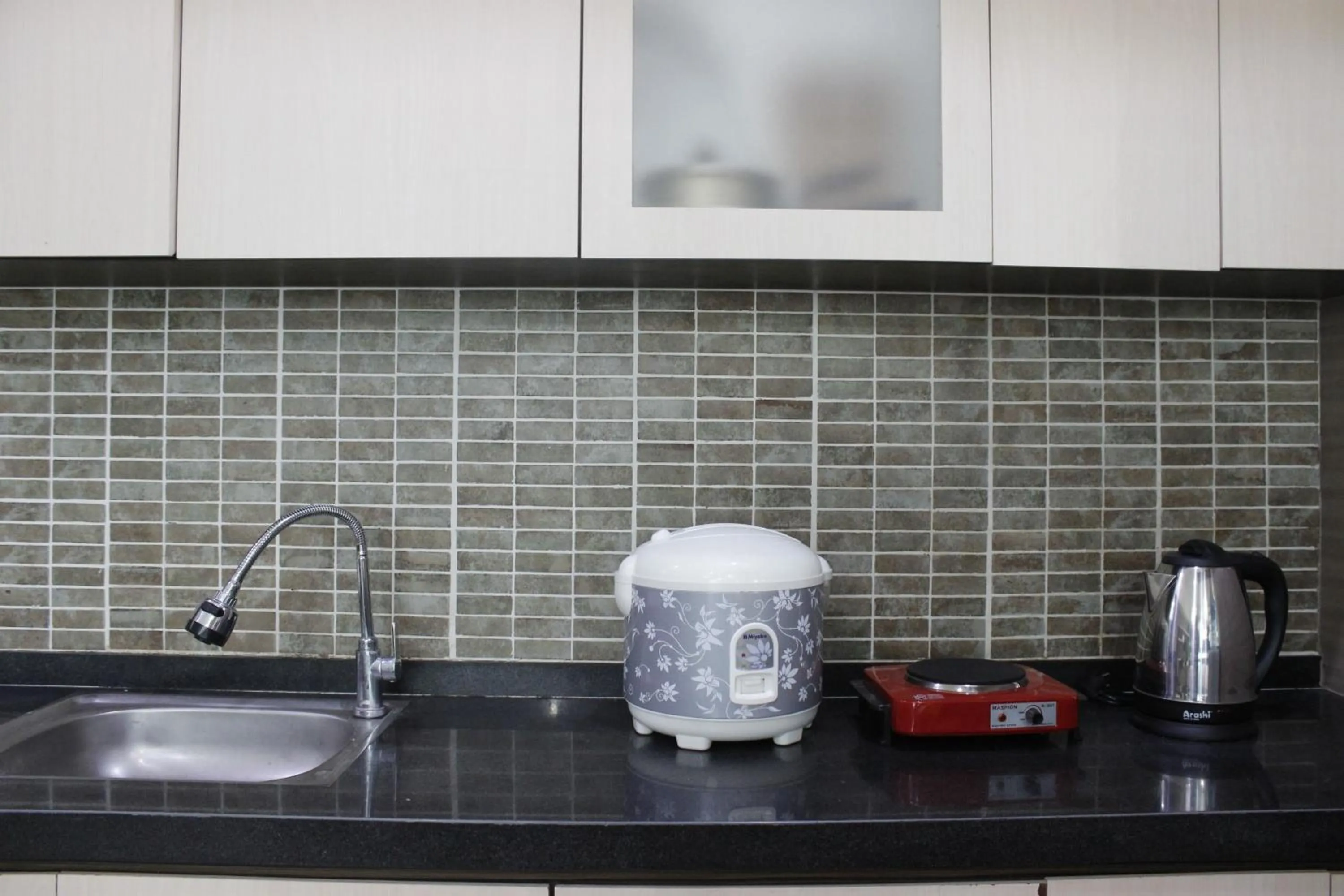 Prime and Comfy Studio at Tamansari La Grande Apartment By Travelio