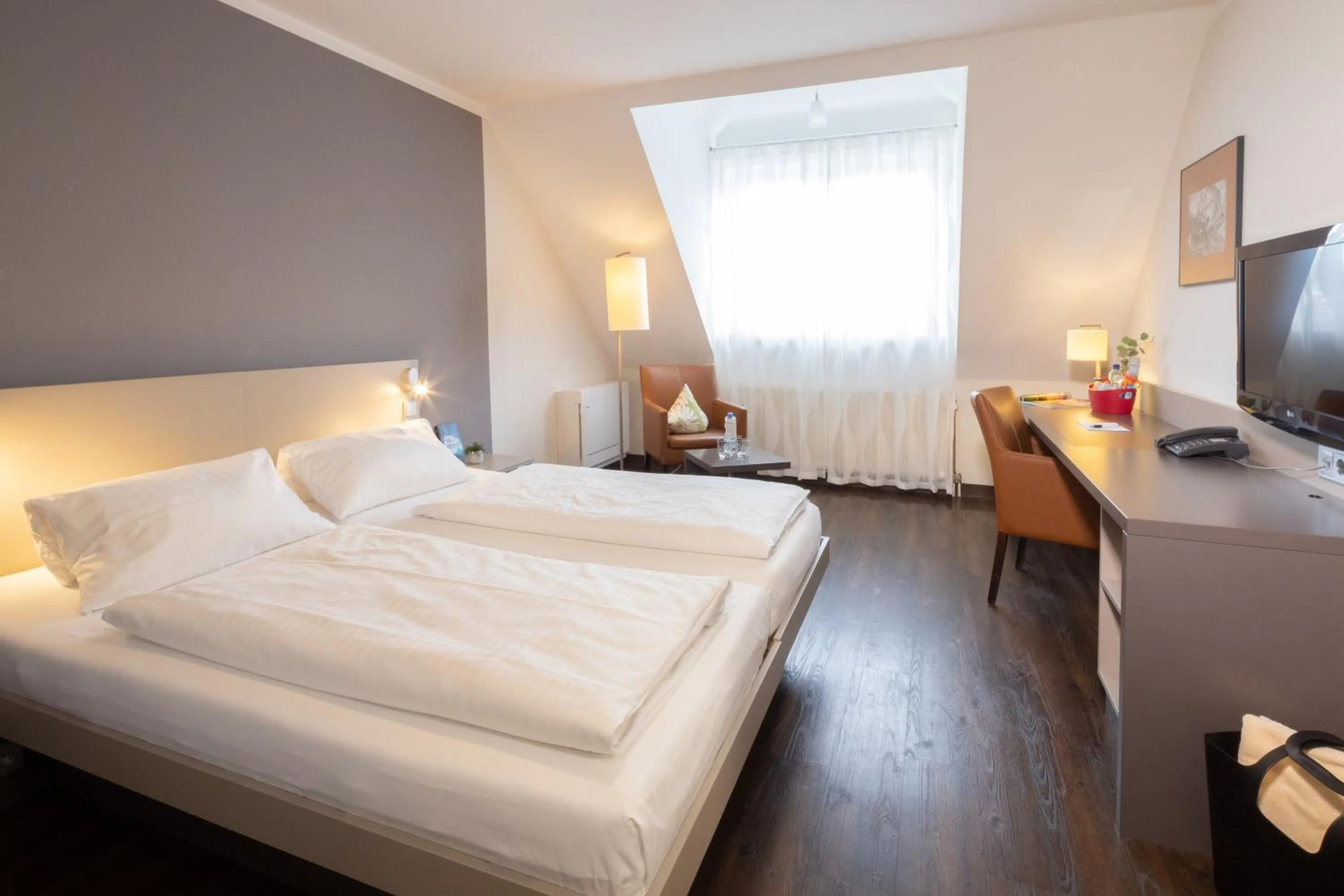 Photo of the whole room, Bed in Hotel Traube am See