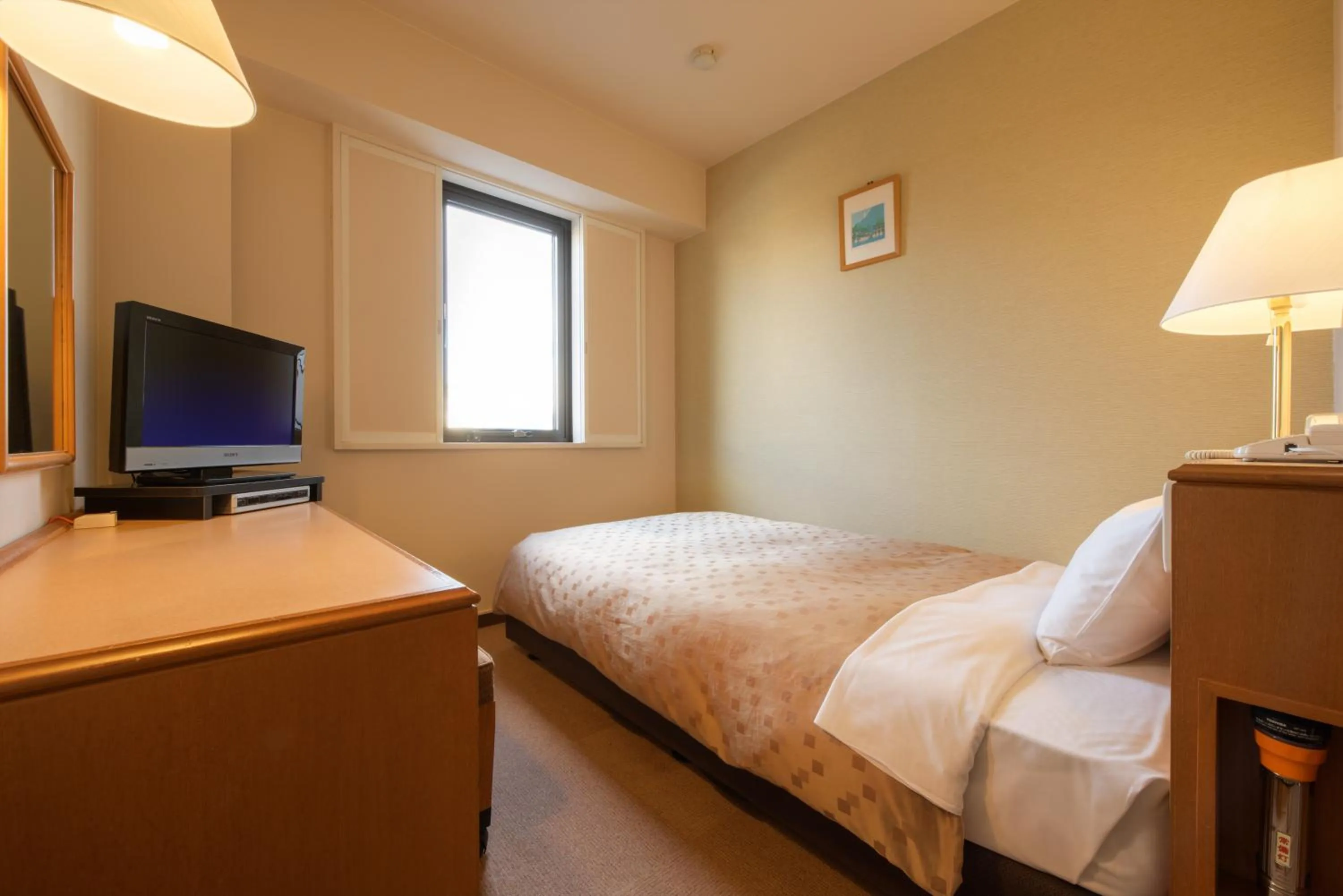 Photo of the whole room, Bed in Pacific Hotel Shiroishi