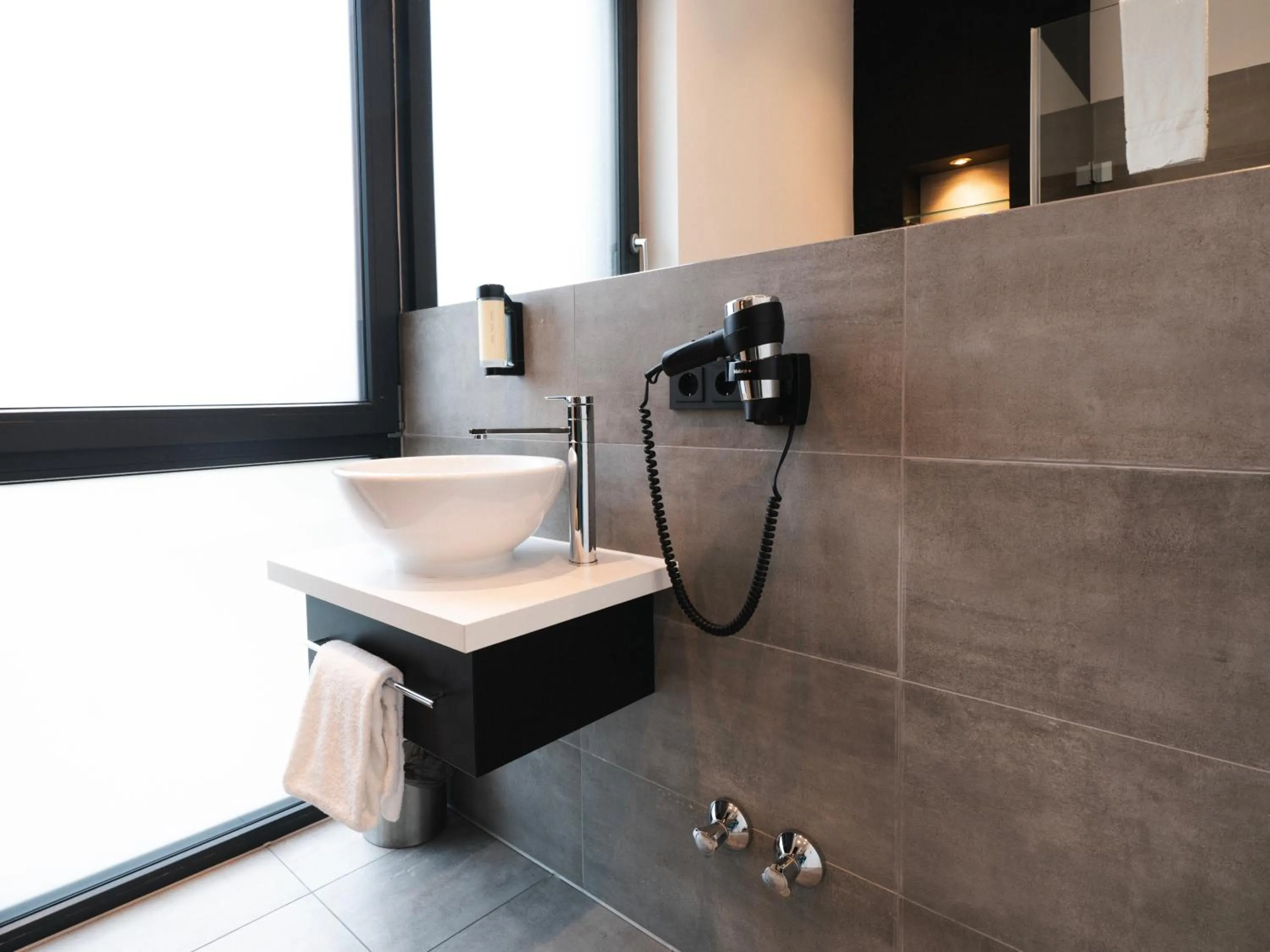 Bathroom in JustStay Grevenbroich Hotel & Apartments