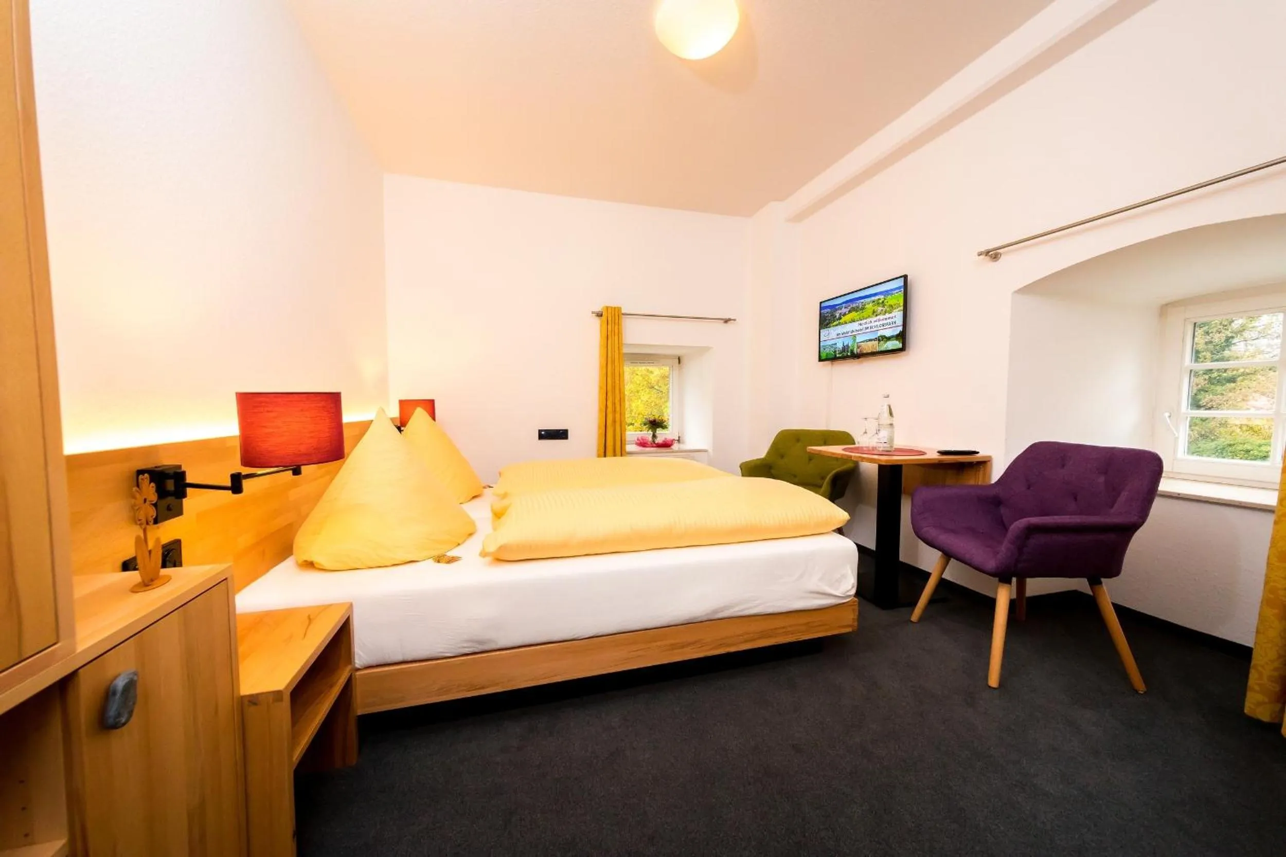 Bed in Wohlfühlhotel IM SCHLOSSPARK - Self CheckIn