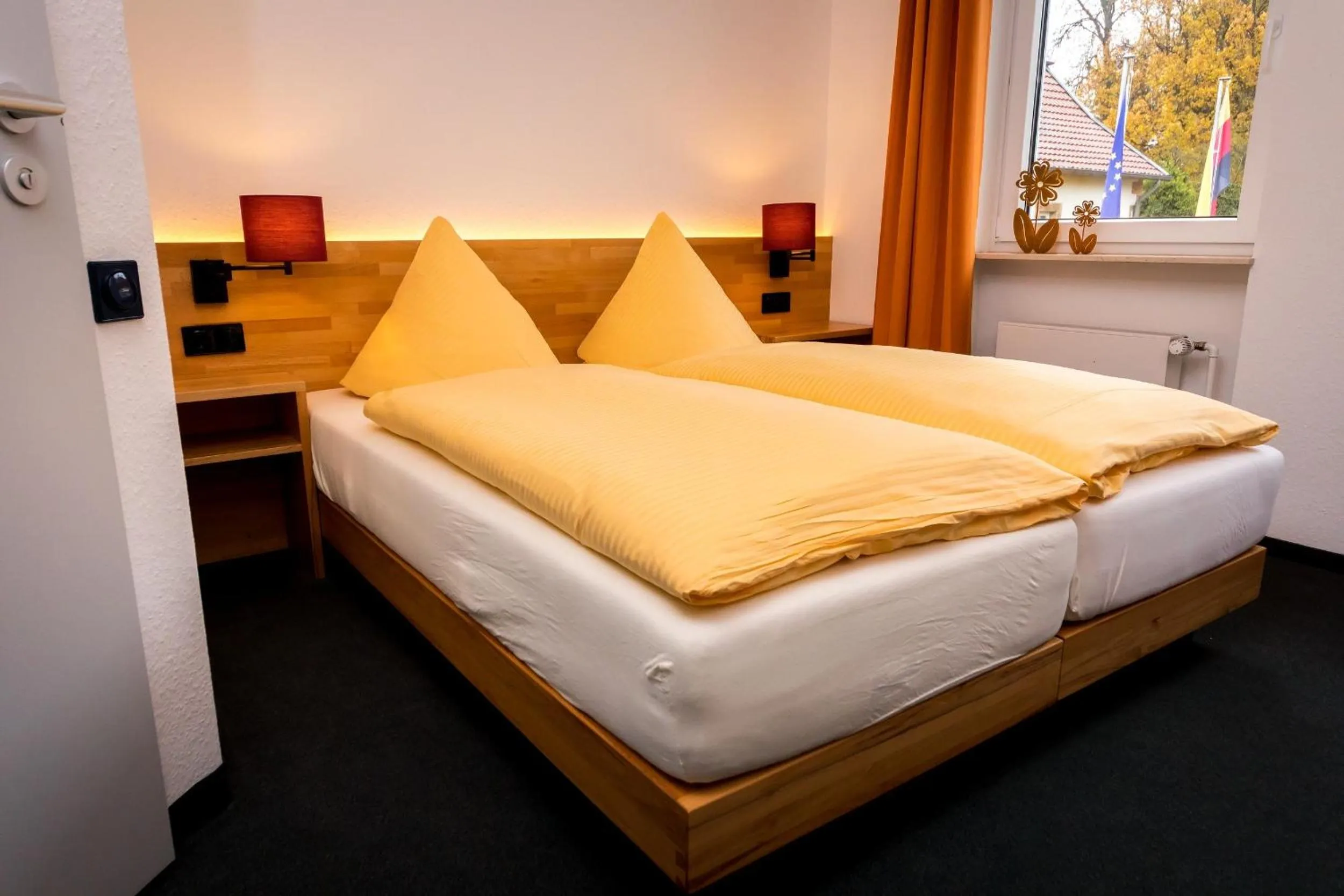 Bed in Wohlfühlhotel IM SCHLOSSPARK - Self CheckIn