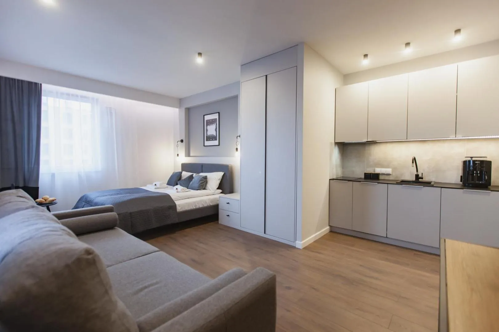 Bed in City Break Atelier Praga Apartamenty