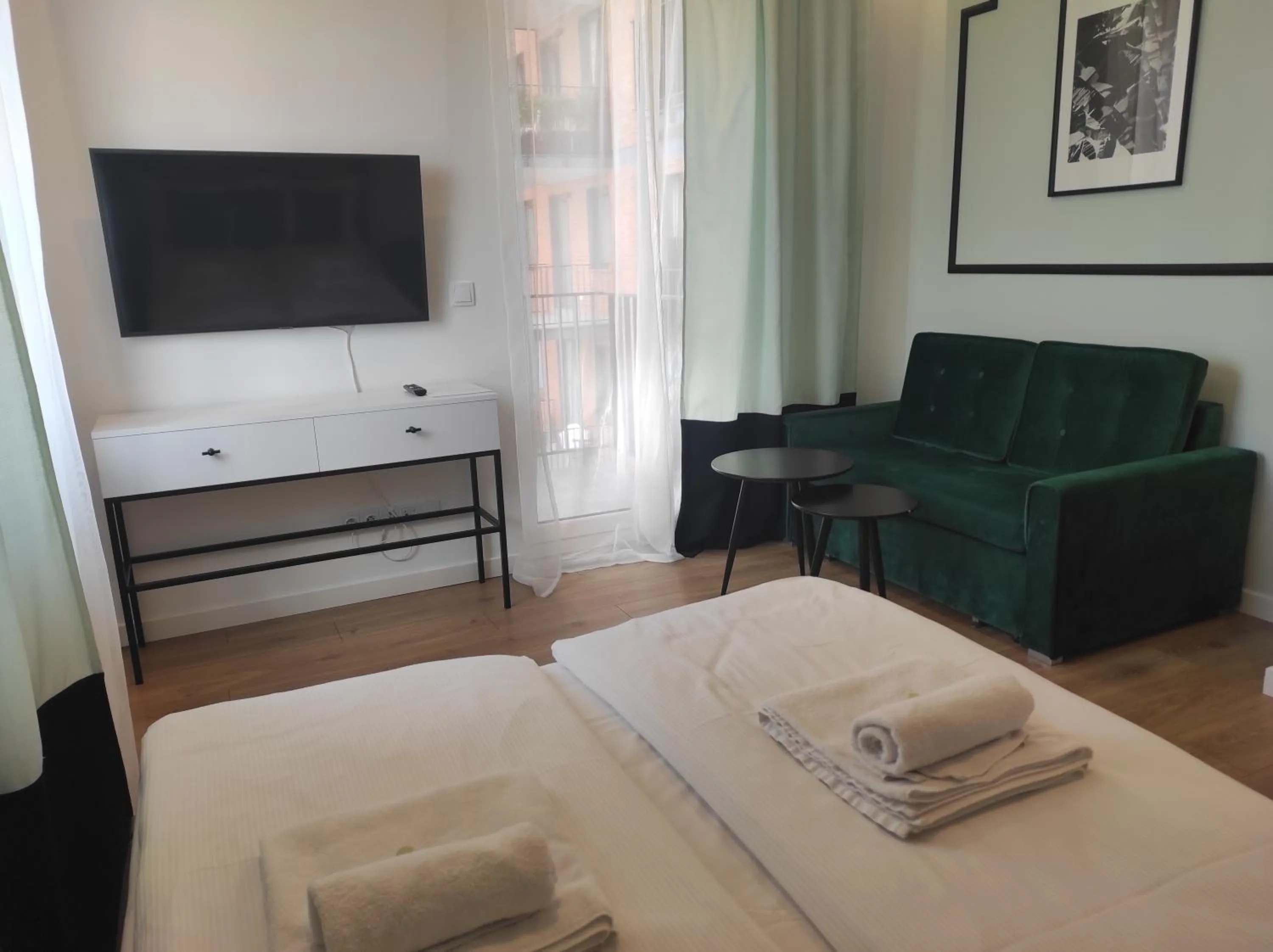 Bed in City Break Atelier Praga Apartamenty