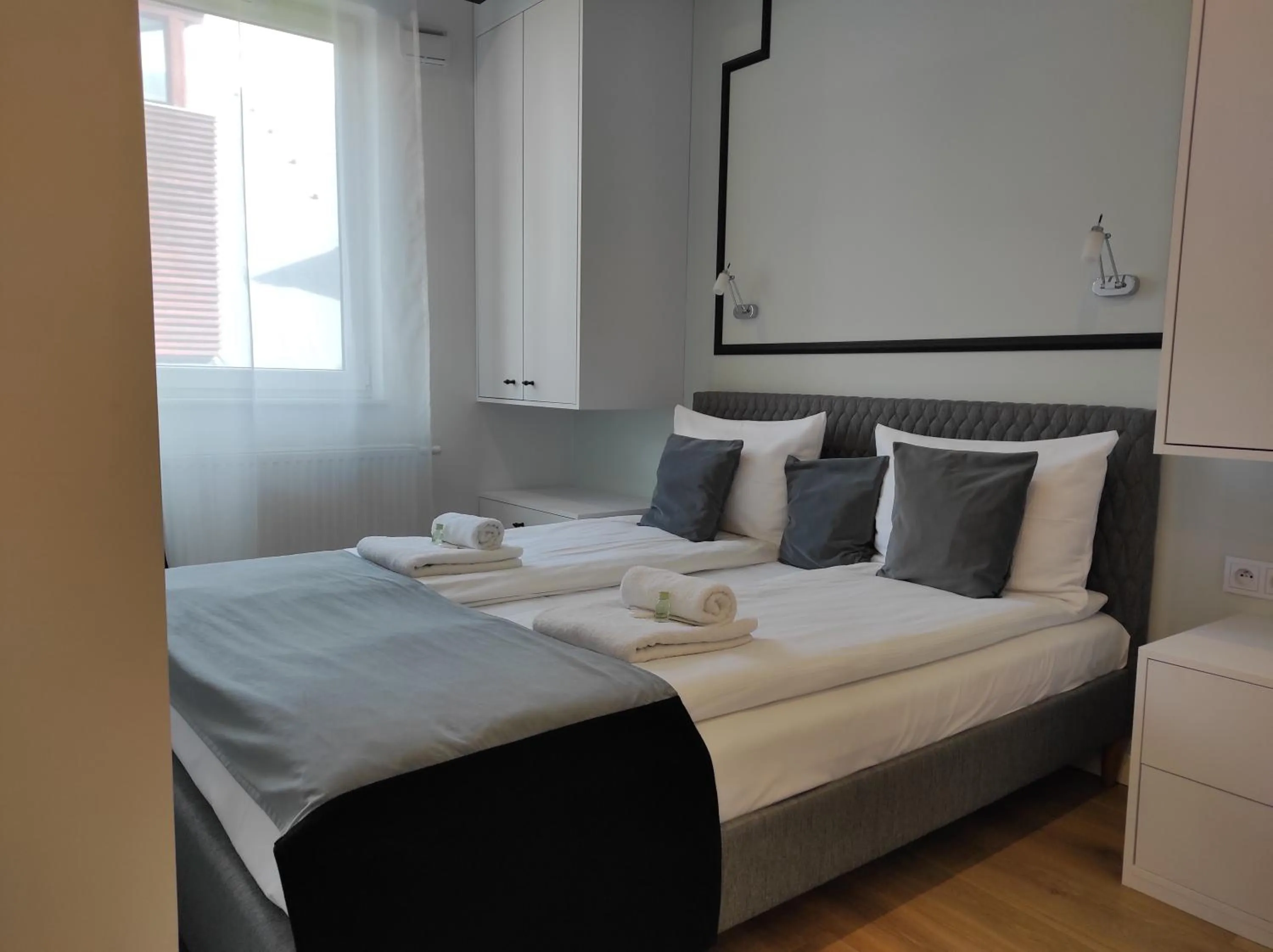 Bed in City Break Atelier Praga Apartamenty