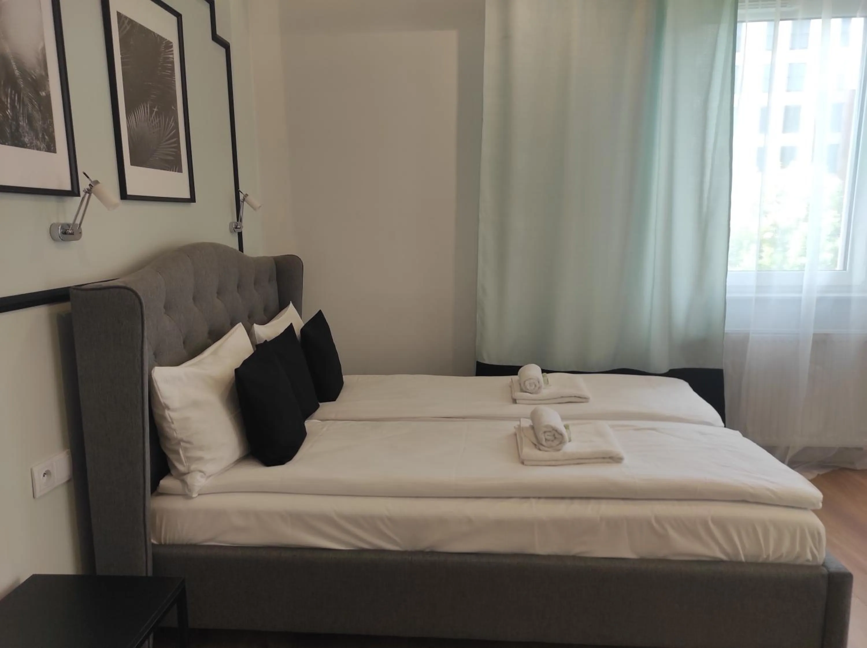 Bed in City Break Atelier Praga Apartamenty