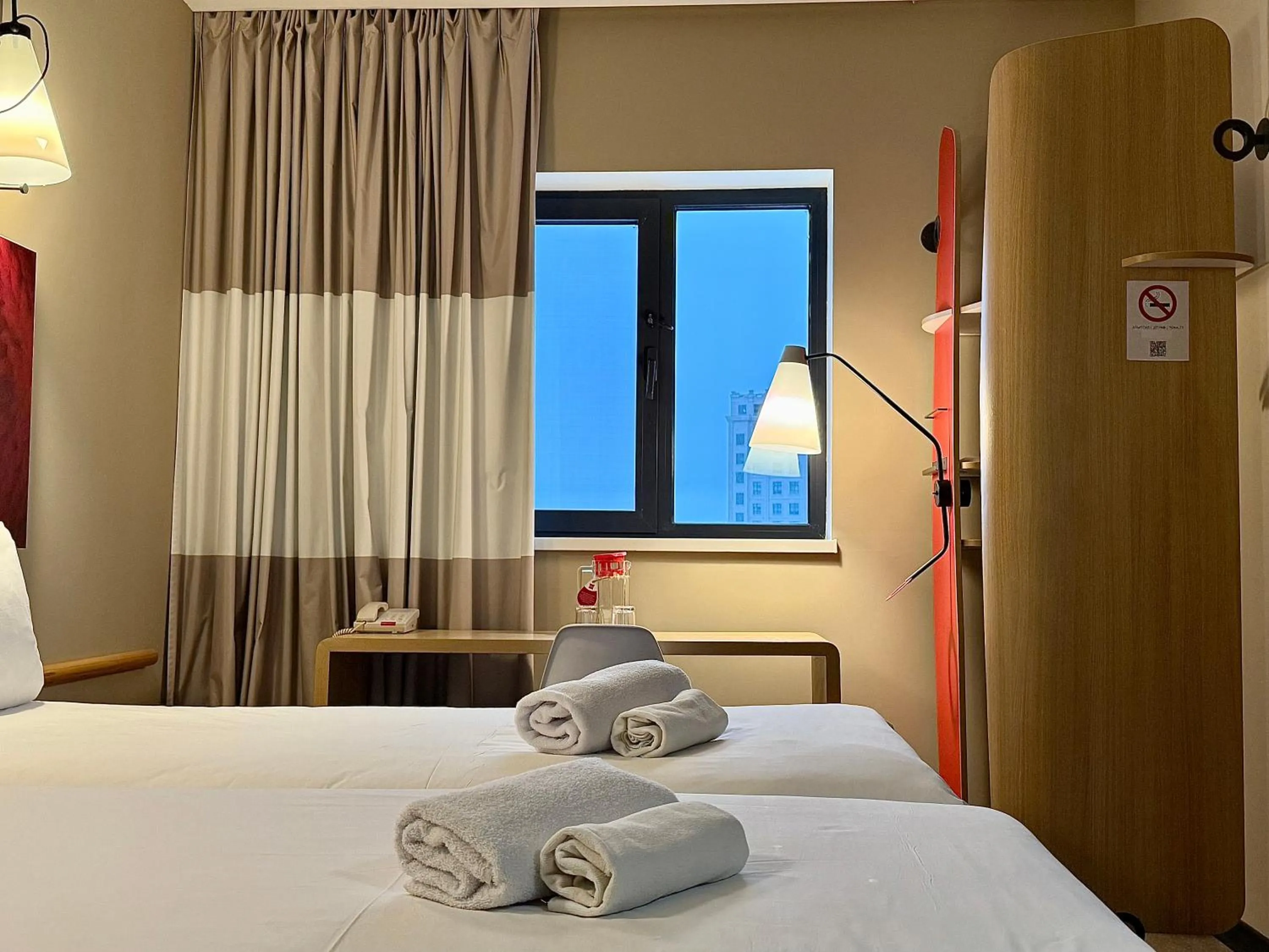 towels, Bed in Ibis Aktobe