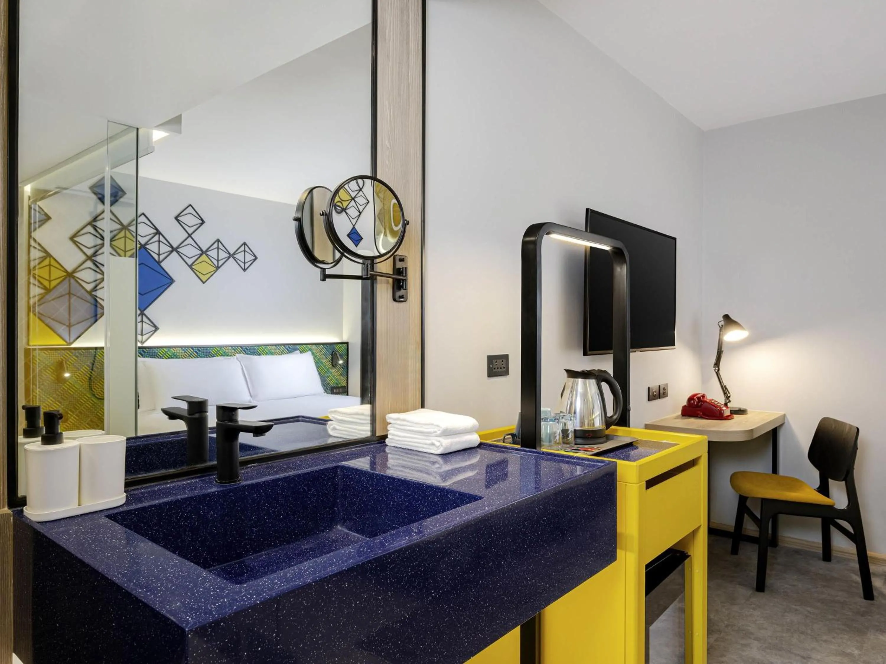 Bedroom in ibis Styles Bangkok Silom