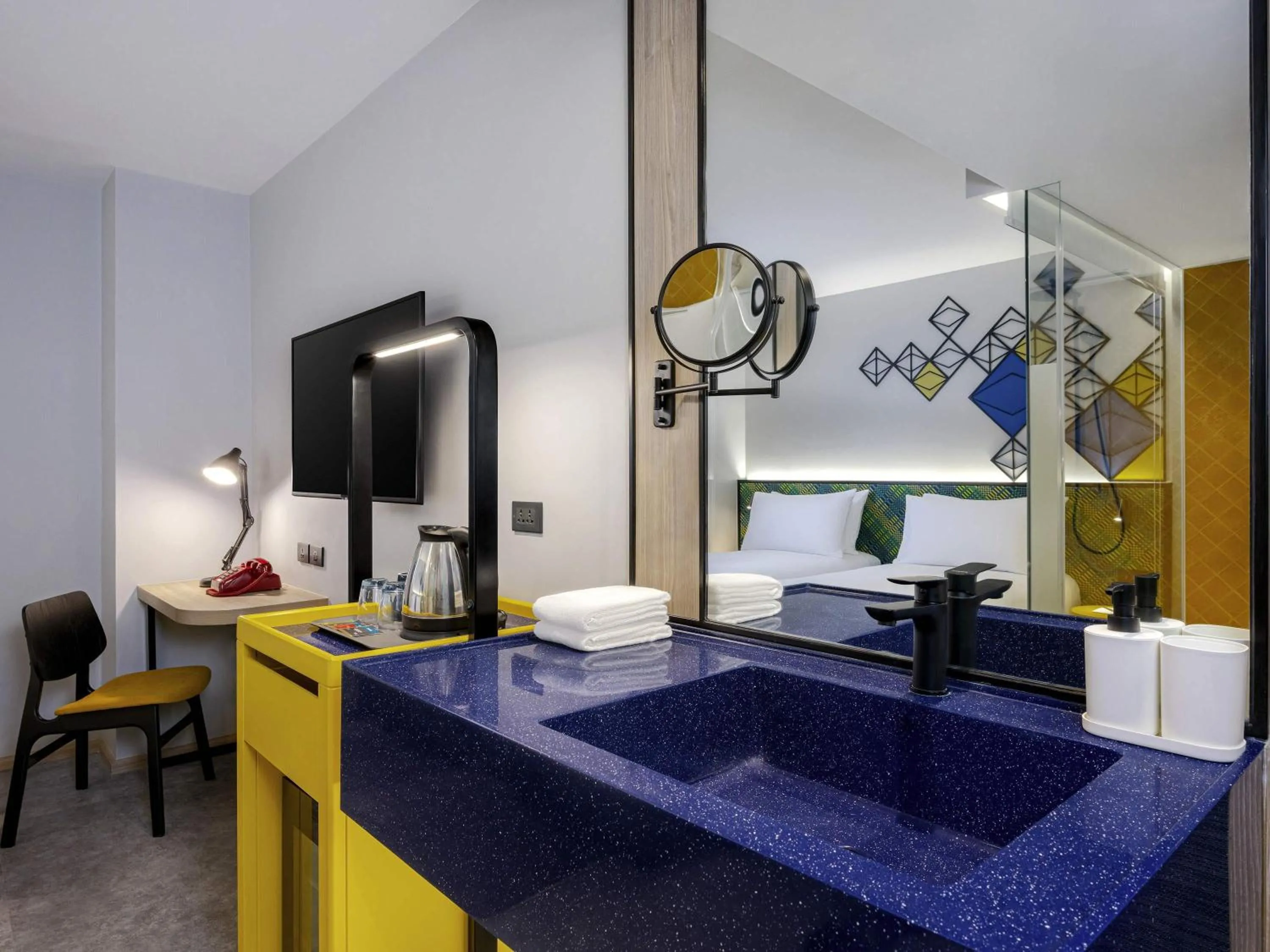 Bedroom in ibis Styles Bangkok Silom