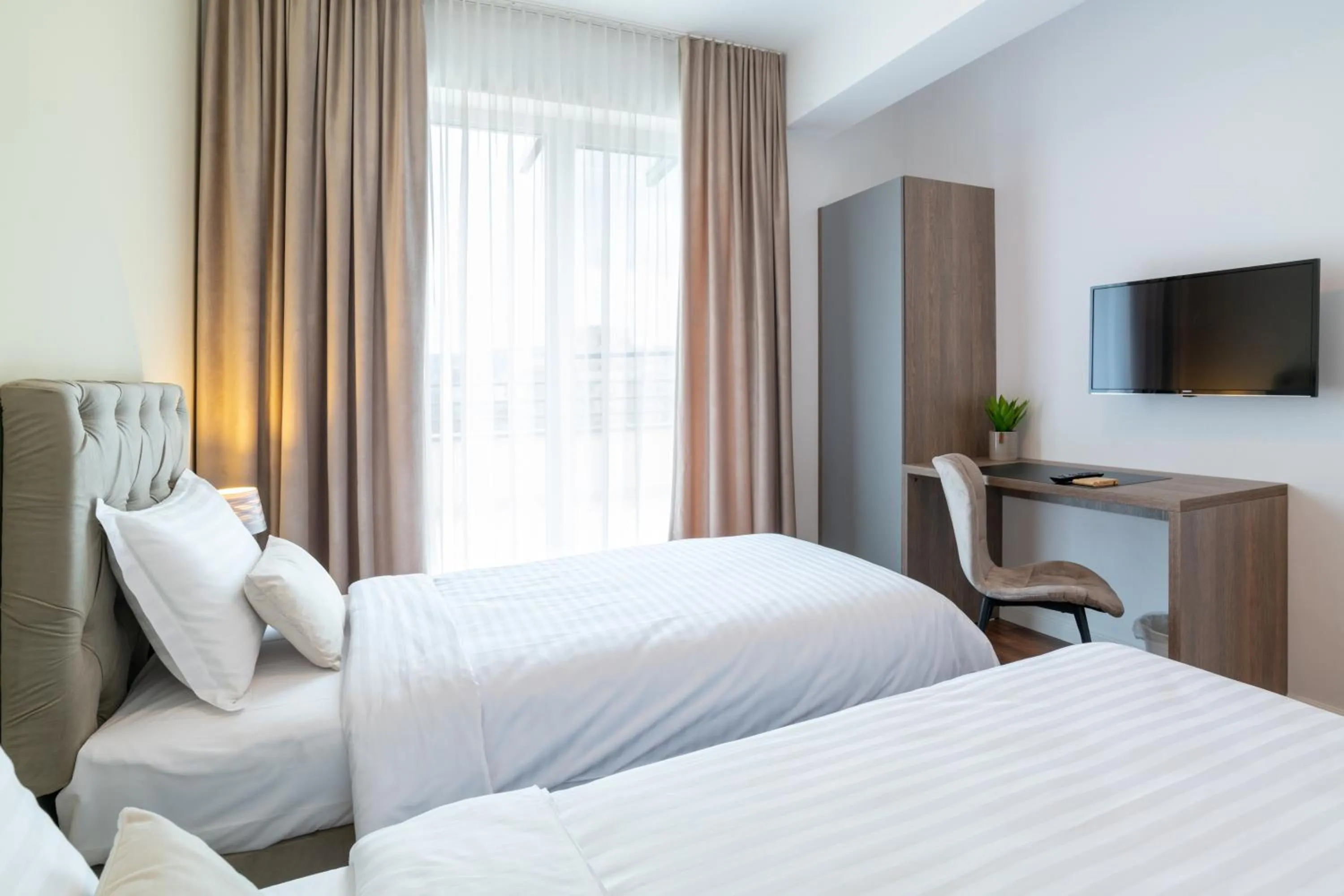 Bed in TCI Apartments