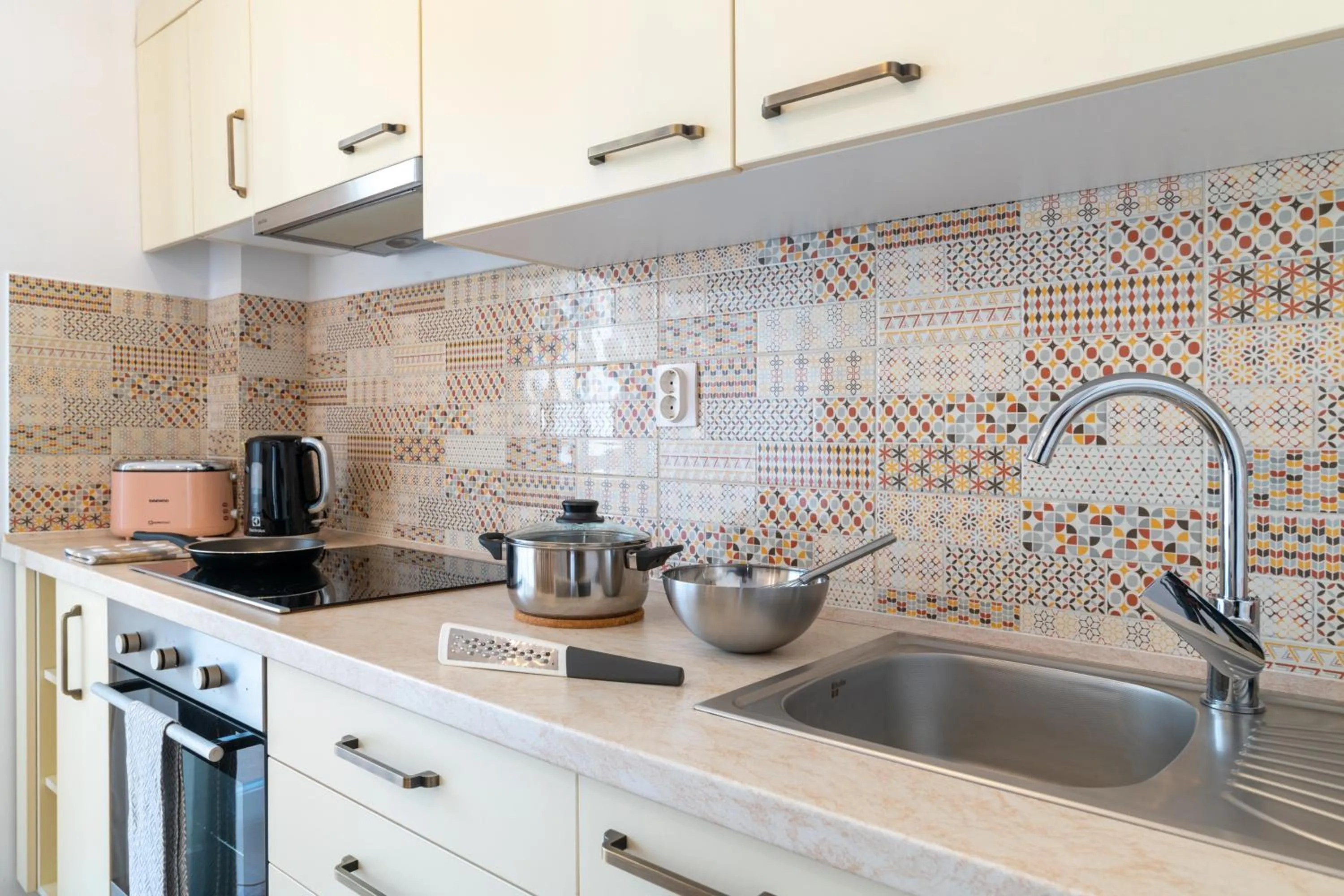Kitchen or kitchenette in TCI Apartments