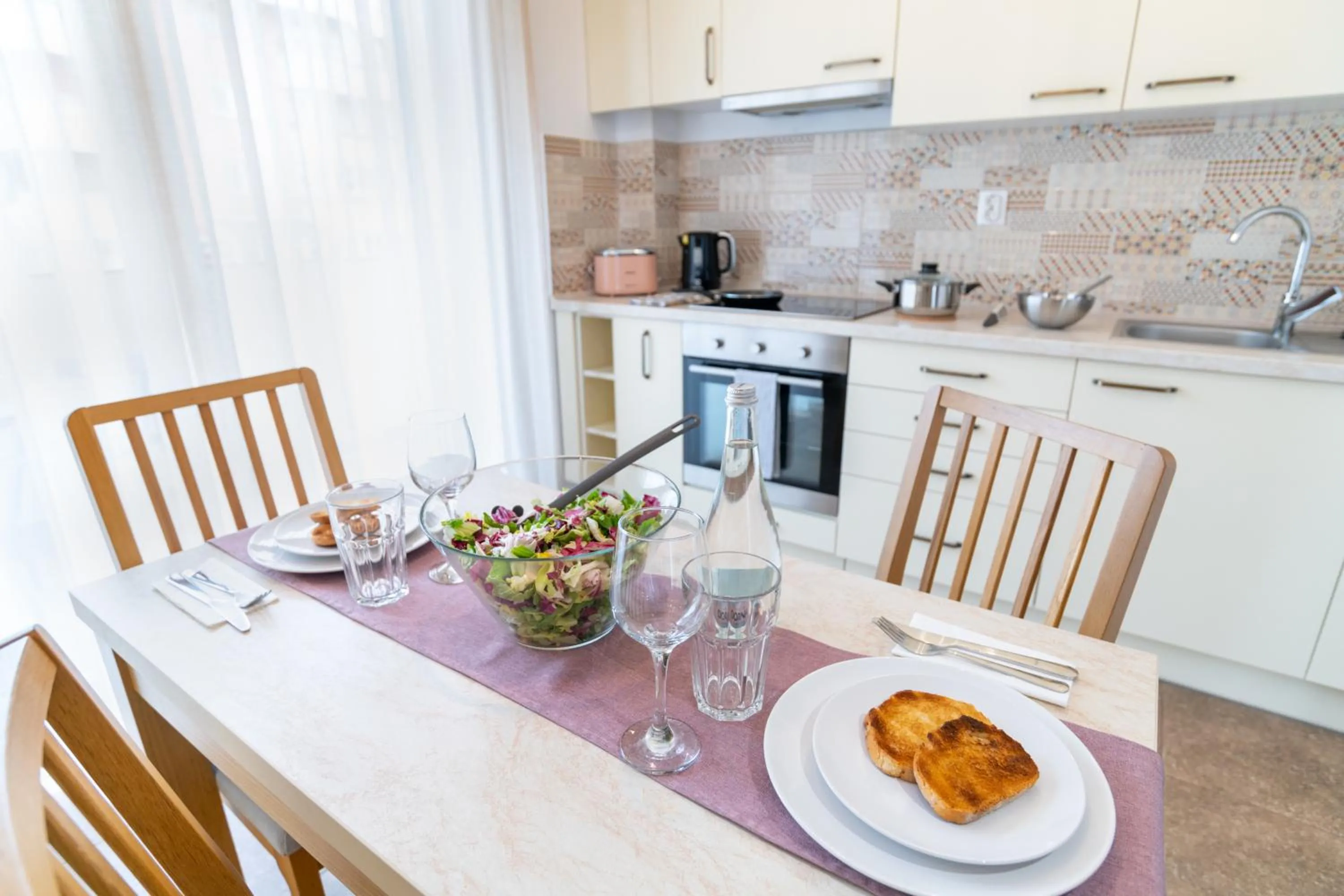 Kitchen or kitchenette in TCI Apartments